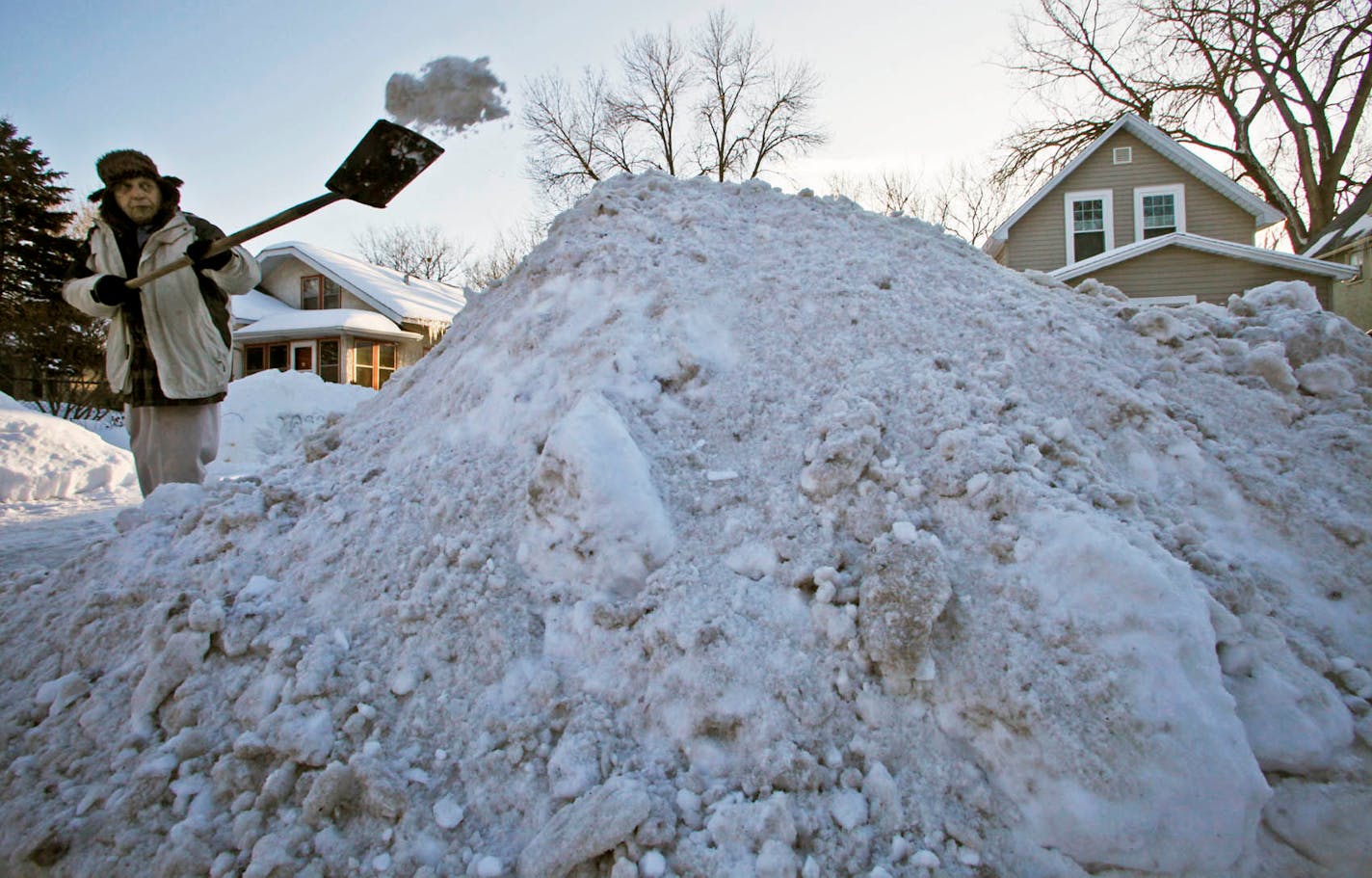 MARLIN LEVISON * mlevison@startribune.com Assign. #20011372A - February 10, 2010 - GENERAL INFORMATION: The Twin Cities have been inundated with snow presenting snow removal problems in the interior of the cities. On and off street parking is at a premium with many cars stuck in drifts after snow plows go by. Minneapolis and St. Paul remain in a snow emergency situation regarding on street parking. IN THIS PHOTO: ] Steve Matz shoveled out his driveway at his SE Minneapolis home.