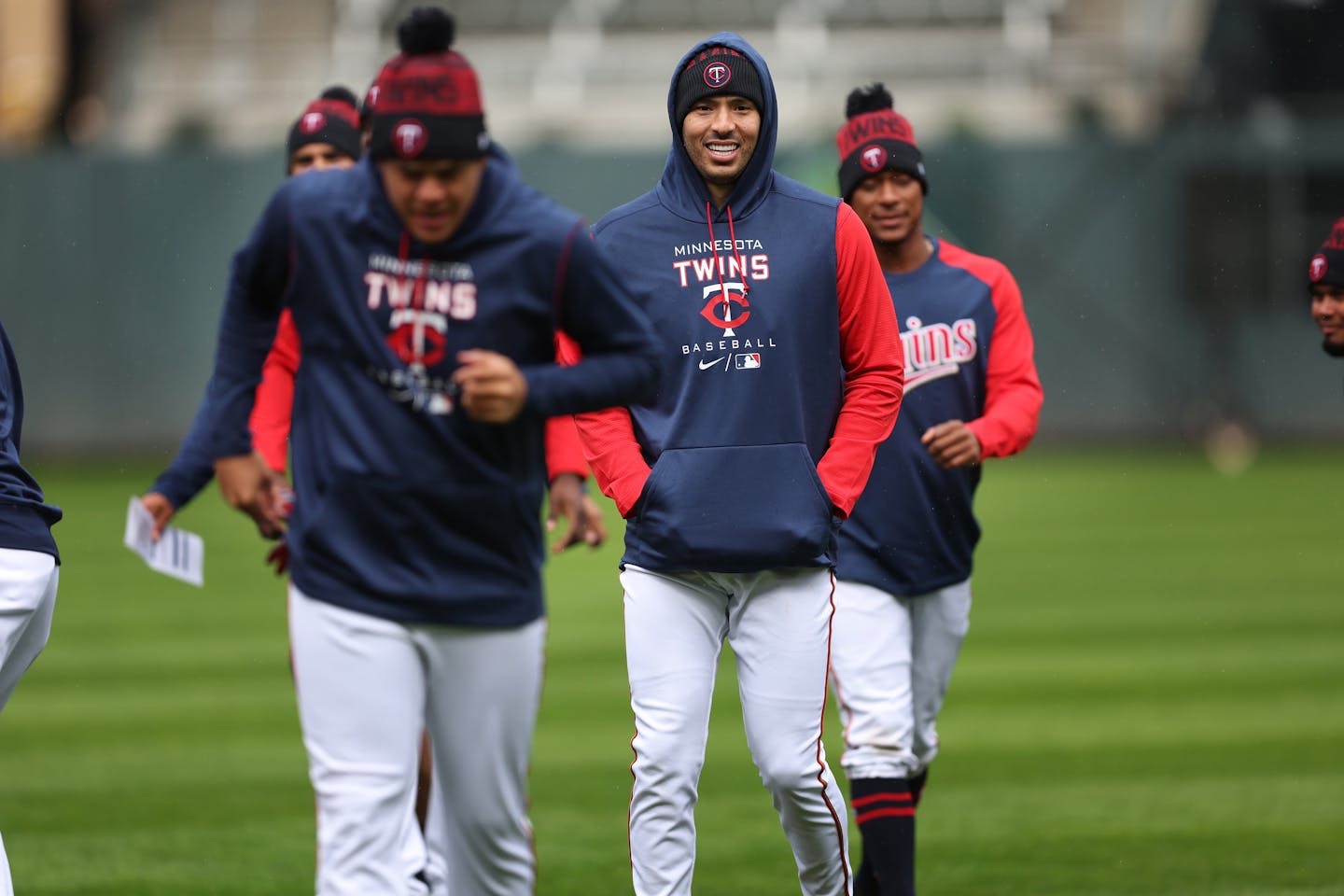 Minnesota Twins shortstop Carlos Correa and teammates held a practice in the drizzling rain at Target Field in Minneapolis, Minn., on Wednesday, April 6, 2022.