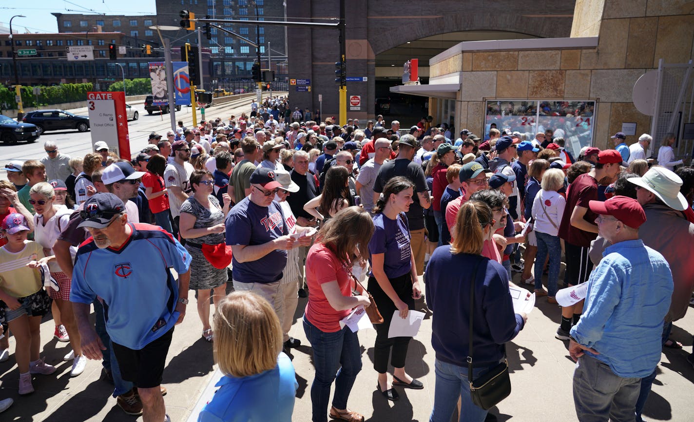 Who is catching Twins fever? With the local lads crushing the world of baseball and a beautiful day for a game on Thursday, the lines were long but fans were rewarded with a victory over the Mariners. Here, the lines were long outside gate 3 as the National Anthem was played inside the park to start the game. ]
brian.peterson@startribune.com
Minneapolis, MN Thursday, June 13, 2019