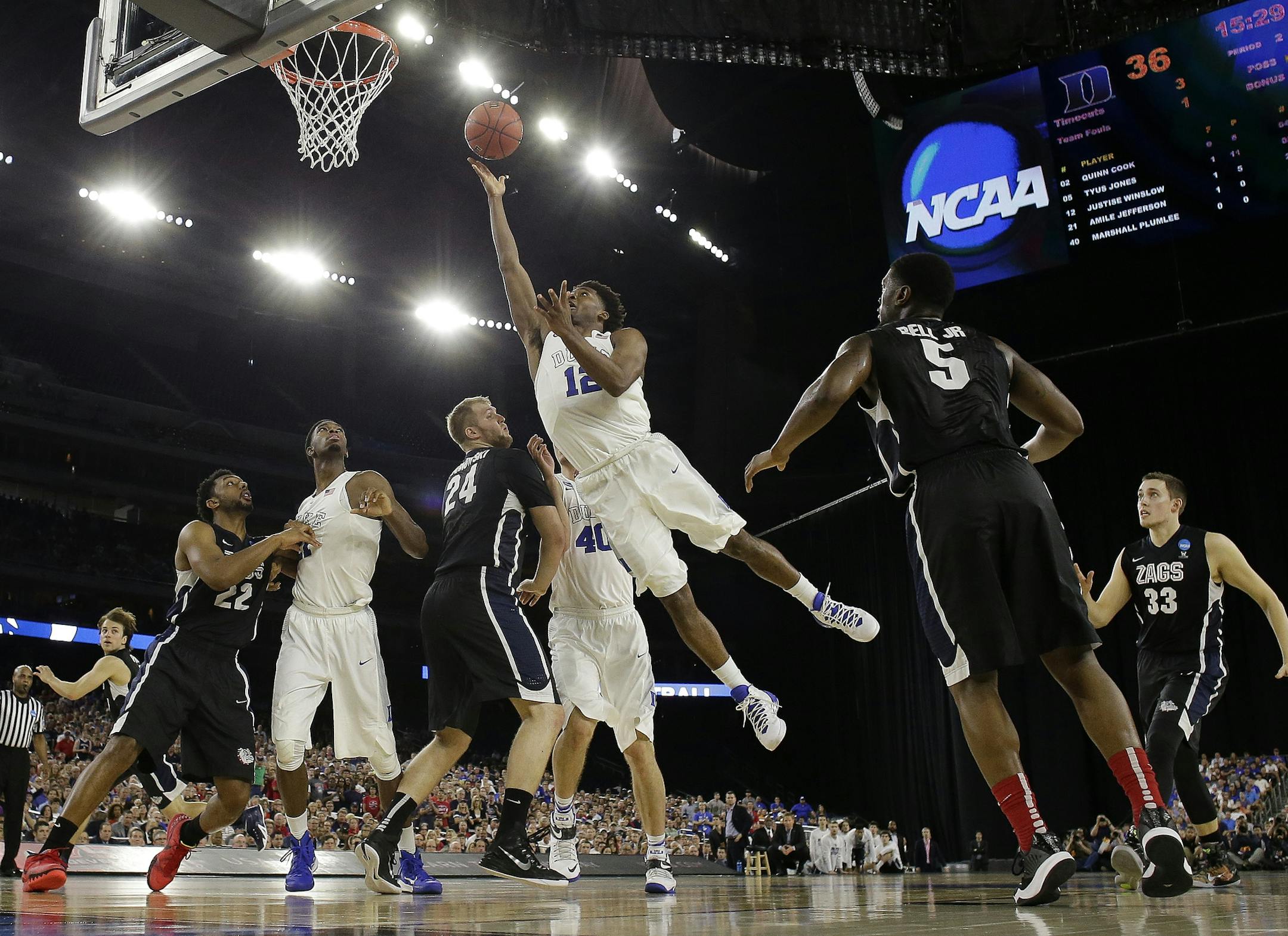 Duke's Justise Winslow shoots against Gonzaga during the second half of a college basketball regional final game in the NCAA Tournament Sunday, March 29, 2015, in Houston. (AP Photo/Charlie Riedel)