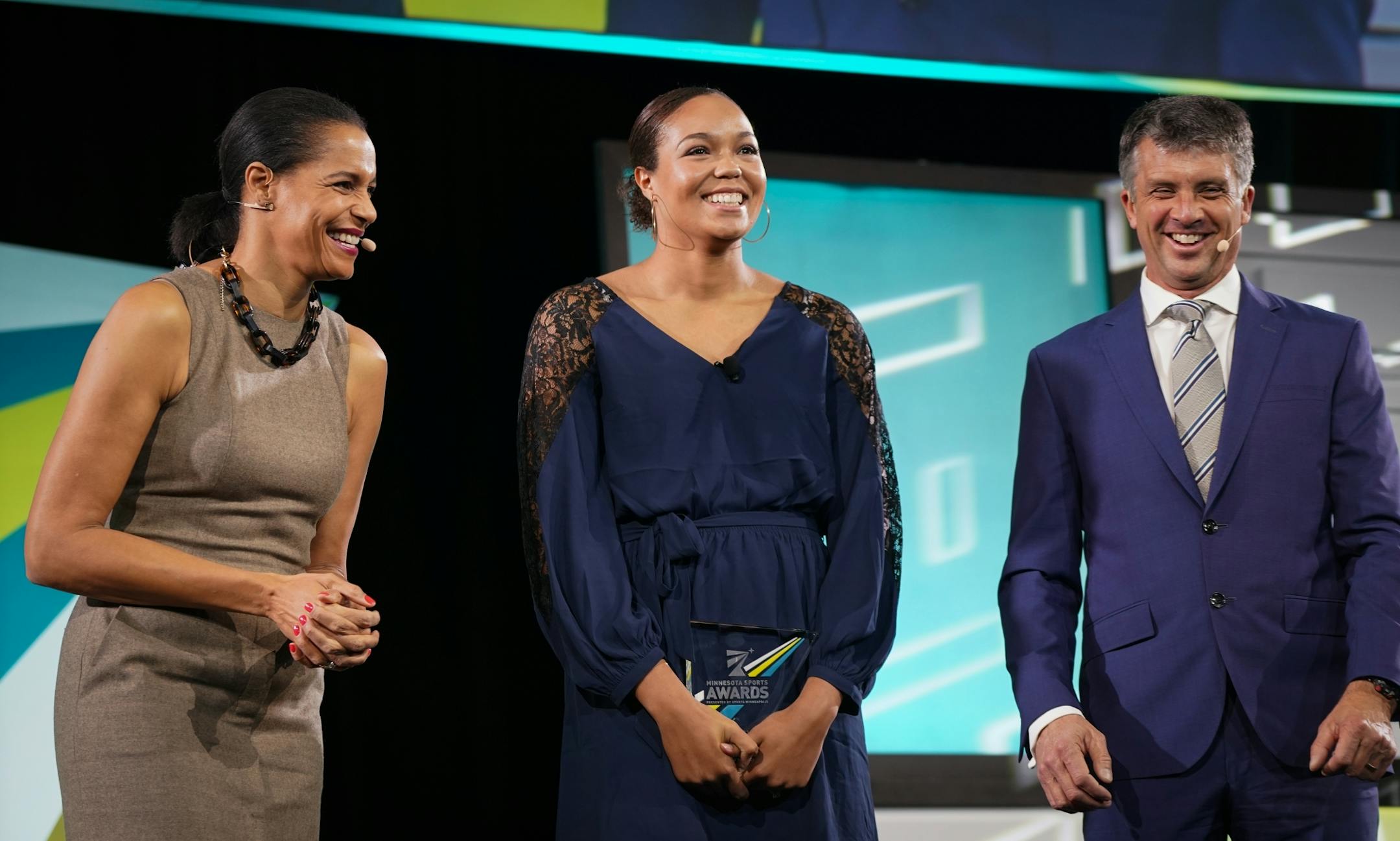 Minnesota Lynx forward and WNBA Rookie of the Year Napheesa Collier (center) accepted her award for Professional Athlete of the Year from Lea B. Olson and Anthony LaPanta during the Minnesota Sports Awards.