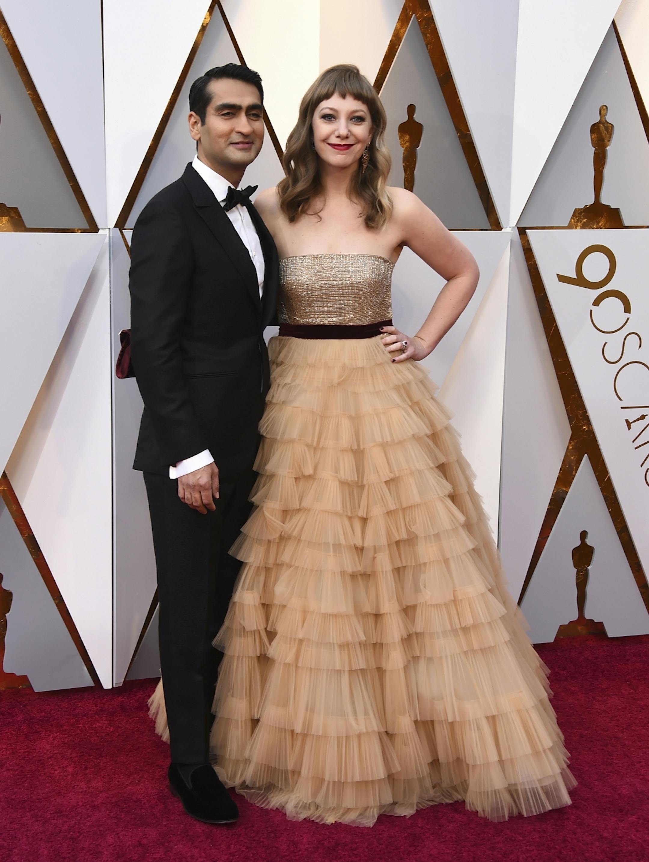 Kumail Nanjiani, left, and Emily V. Gordon arrive at the Oscars on Sunday, March 4, 2018, at the Dolby Theatre in Los Angeles.