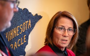 Senate Majority Leader Erin P. Murphy (DFL-St. Paul) speaks to the press during the last day of the legislative session at the Minnesota Capitol in St
