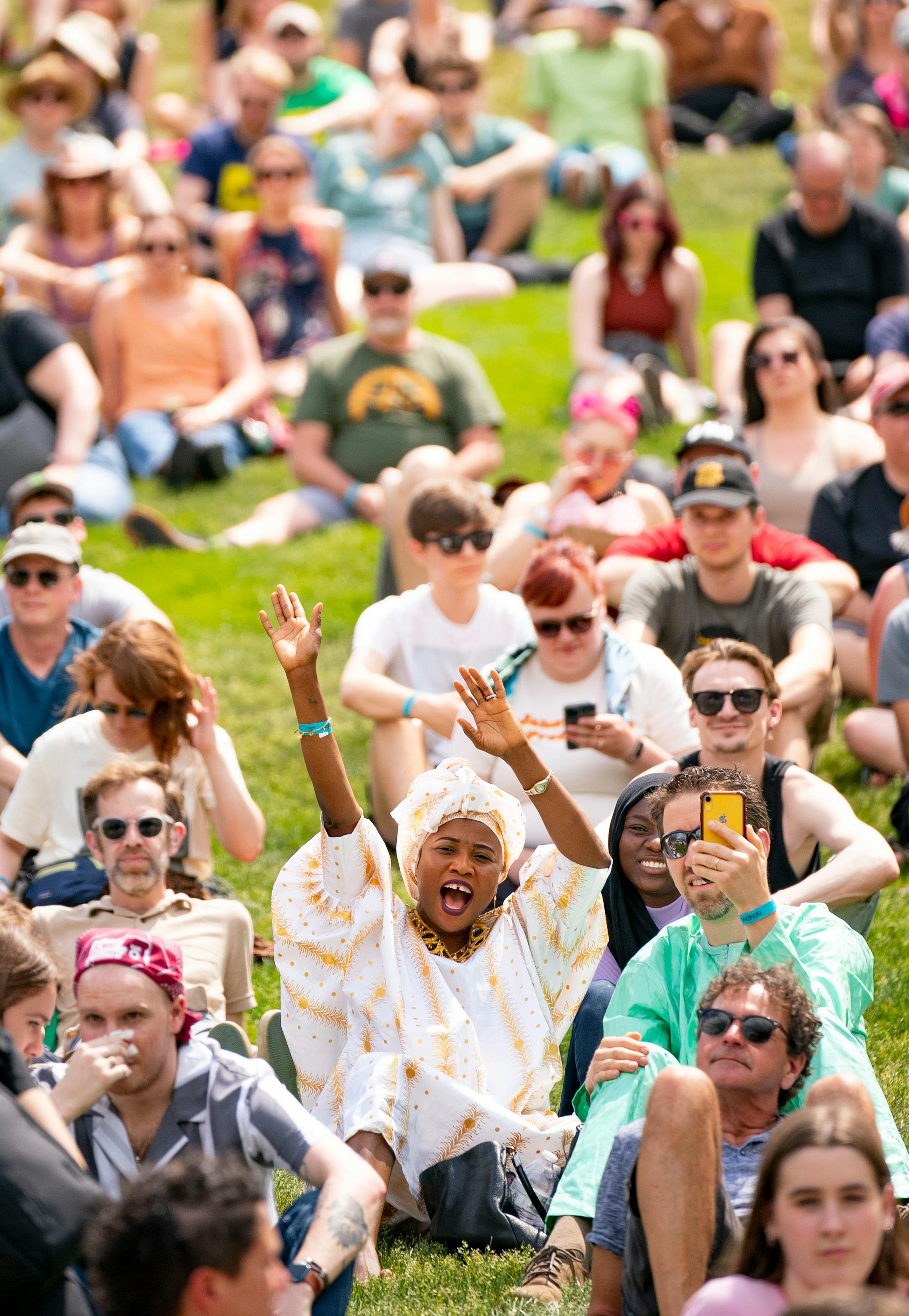 Salmeye Issoufou dances while Bombino performs during Rock the Garden.