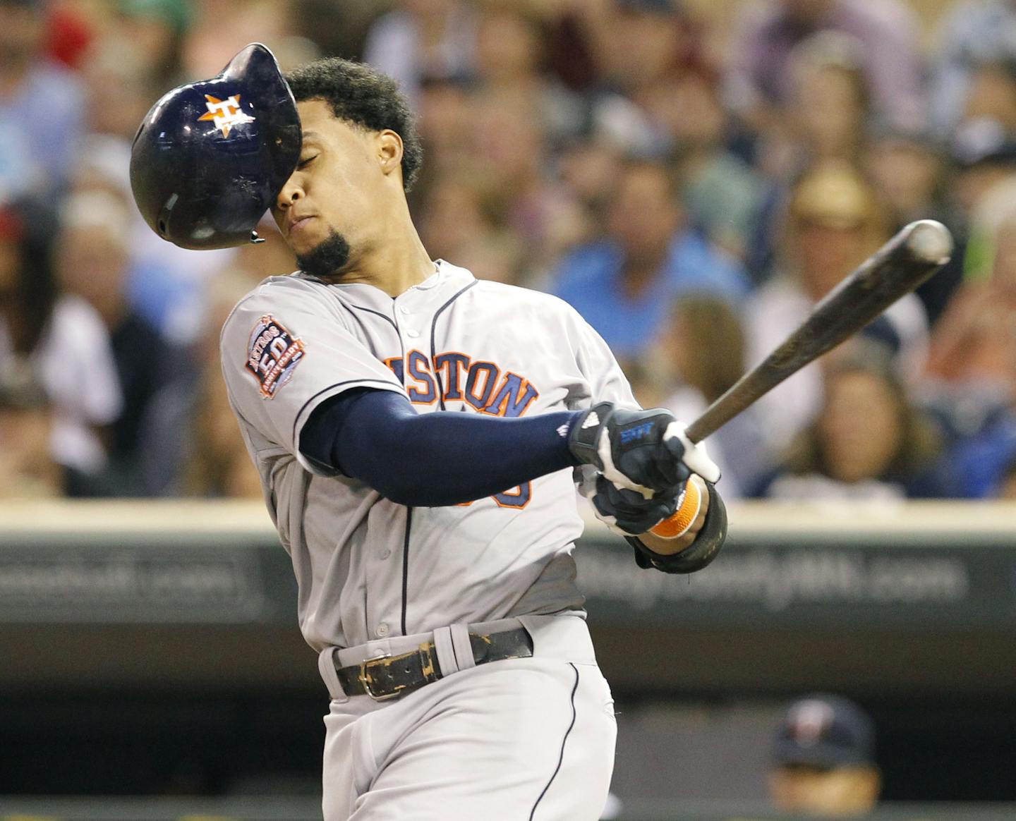 Houston Astros' Carlos Gomez loses his batting helmet as he swings for a strike against Minnesota Twins starting pitcher Kyle Gibson during the fourth inning of a baseball game in Minneapolis, Friday, Aug. 28, 2015. (AP Photo/Ann Heisenfelt)