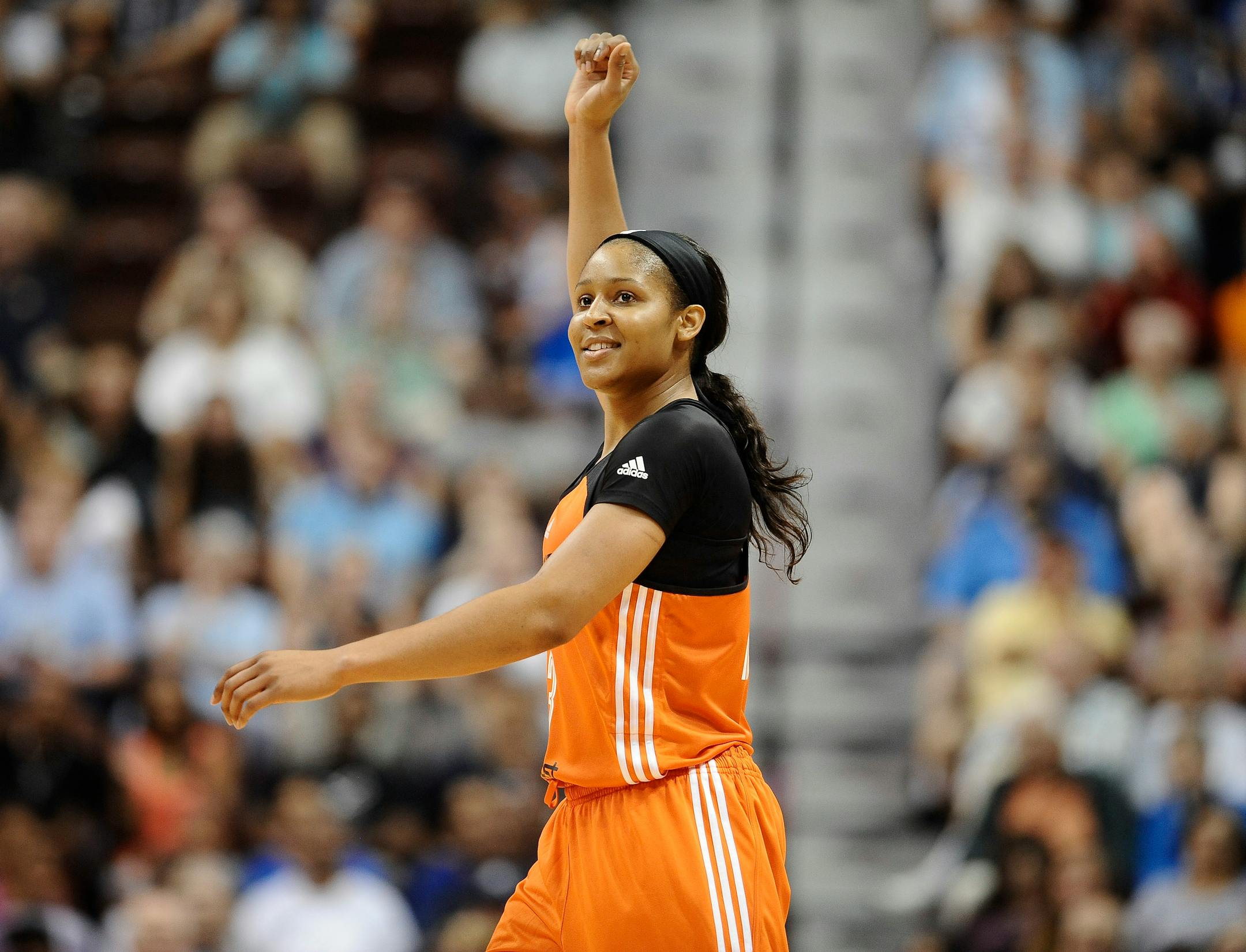 West's Maya Moore, of the Minnesota Lynx, reacts in the final seconds the WNBA All-Star basketball game, Saturday, July 25, 2015, in Uncasville, Conn. The West won 117-112. Moore, who scored 30 points, was named MVP. (AP Photo/Jessica Hill)