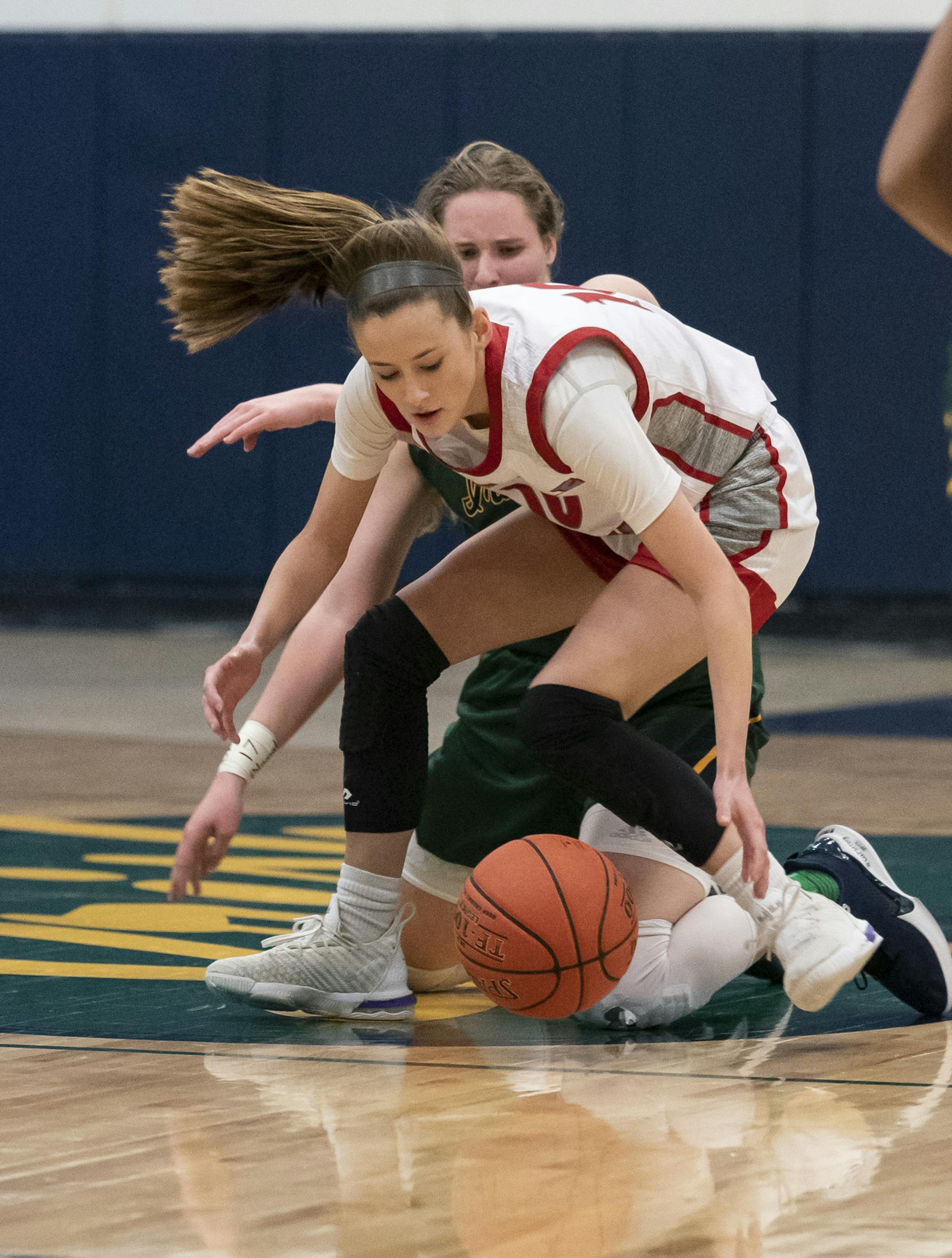 Lakeville North guard Morgan Robison (10) stole the ball from Rosemount forward Helen Staley (4) in the first half of their section final game on March 43 at Rosemount High School. Photo: RENEE JONES SCHNEIDER ¥ renee.jones@startribune.com