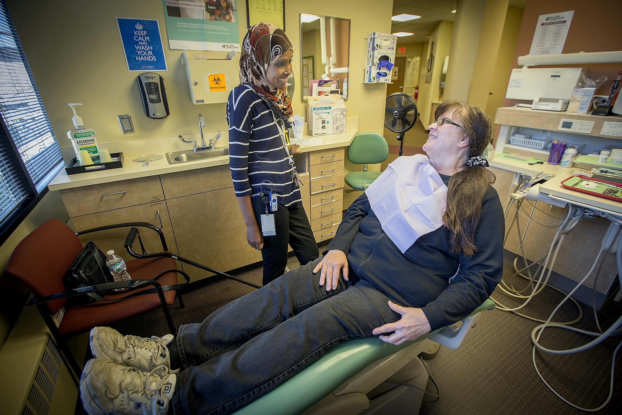 Dentist Dr. Sagal Nur checked in on a patient at Open Cities Health Center, Thursday, July 27, 2017 in St. Paul, MN.