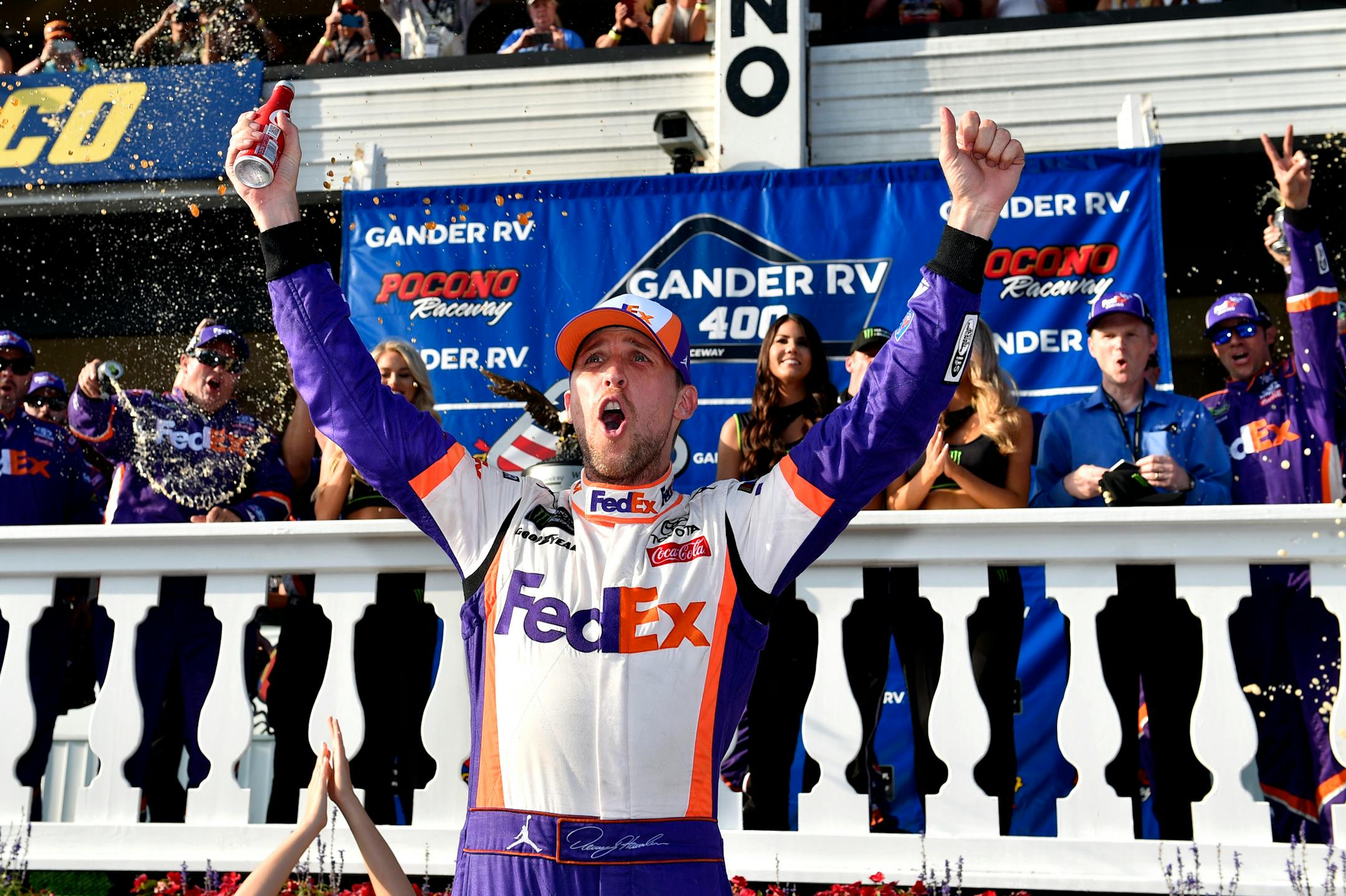 Denny Hamlin celebrated in Victory Lane at Pocono.