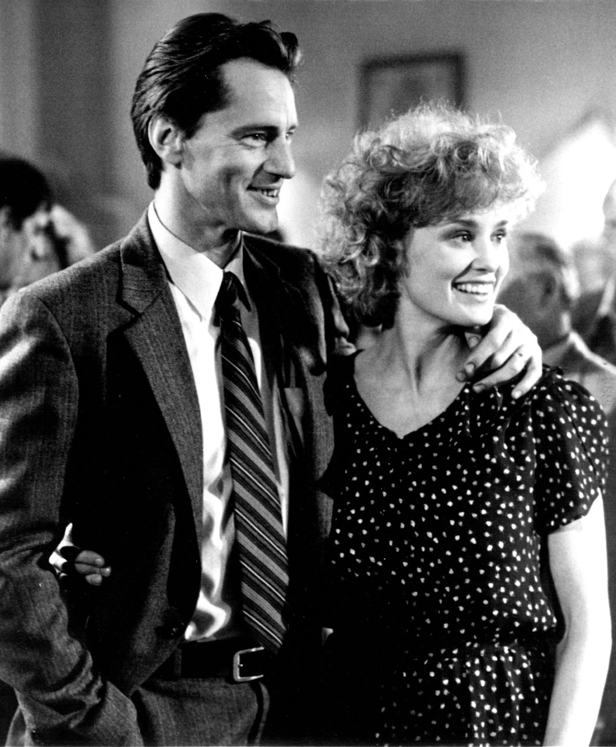 November 17, 1985 Jewell Ivy (Jessica Lange) and her husband. Gil (Sam Shepard), enjoy themselves at the town dance in "Country." the stirring drama of a contemporary farm family waging an heroic struggle to keep their land. Wilford Brimley also stars in the Touchstone Films presen-tation of A Far West Productions and Pangaea Corporation Production. The film was written by William D. Wittliff, who also produced with Lange. Richard Pearce directed. Charles Gross composed the original score. In co