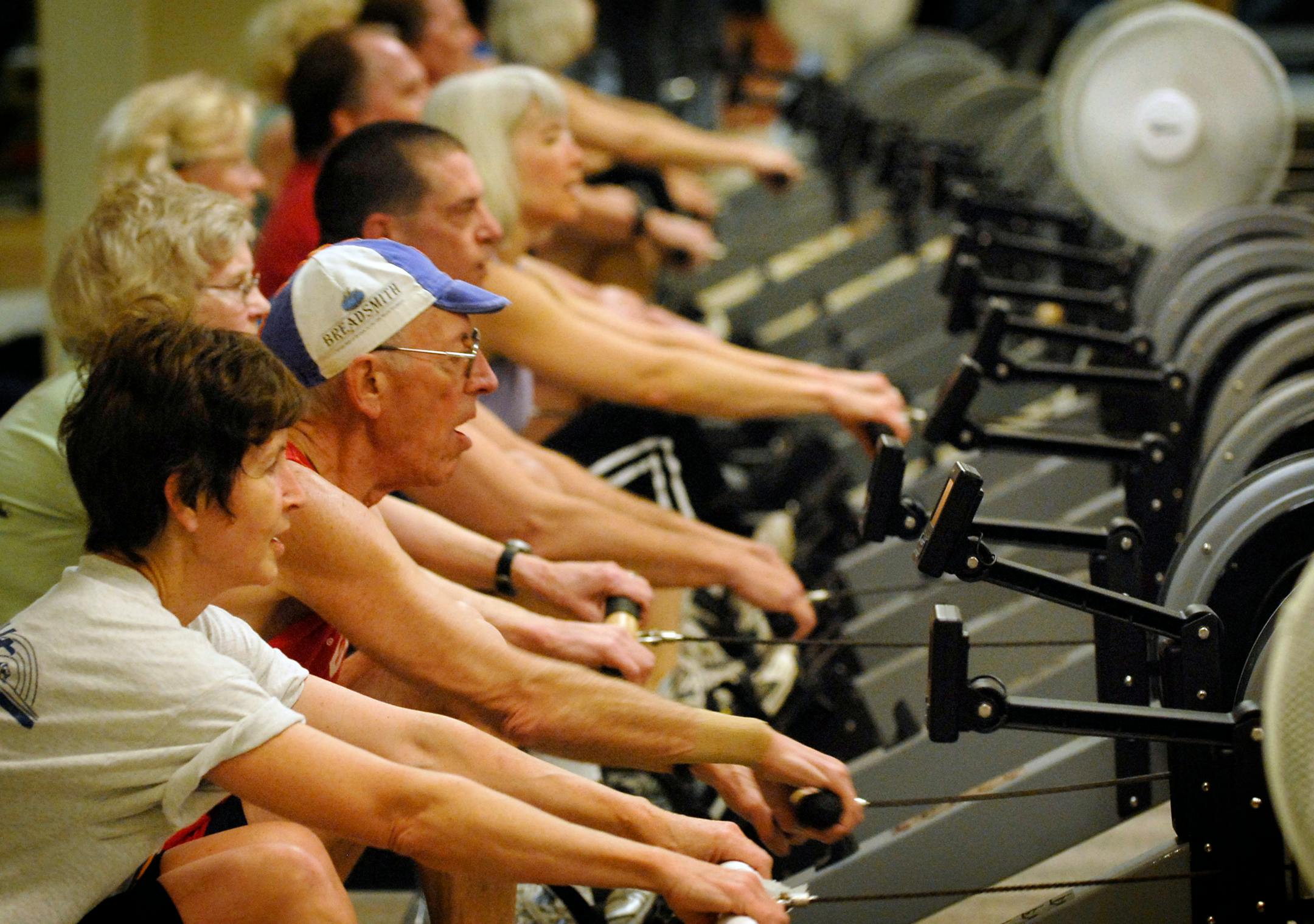 Maryann Mortenson, front, Bert Keel, Sarah Keel, Phil Kaiser, Jan Jahn and MaryJo Permuth exercised Friday during a rowing-machine class at the Burnsville Life Time Fitness. They show up every Monday, Wednesday and Friday at 5:30 a.m. for the 45-minute workouts.