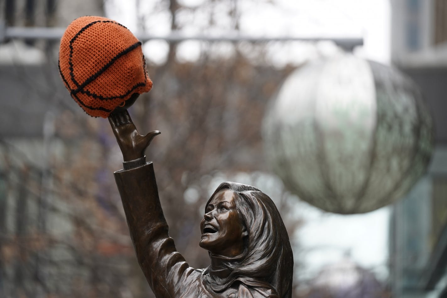 The Mary Tyler Moore statue is decorated for the Final Four outside the Tip-Off Tailgate on Nicollet Mall.