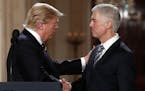President Donald Trump shook hands with Neil Gorsuch, his pick for Supreme Court justice, in the East Room of the White House.