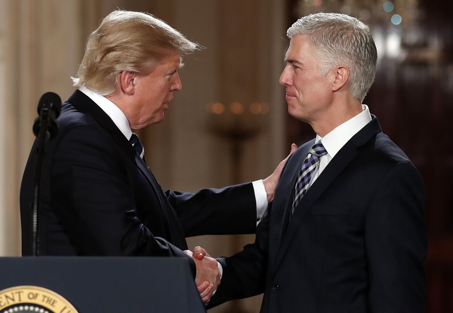 President Donald Trump shook hands with Neil Gorsuch, his pick for Supreme Court justice, in the East Room of the White House.