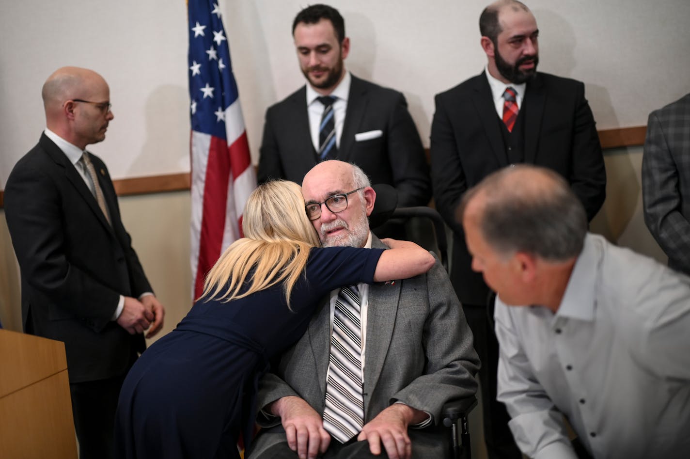 Republican state Sen. Karin Housley embraced DFL Sen. David Tomassoni after a newsconference highlighting S.F. 3310 and S.F. 3372, which establish grants for caregivers of ALS patients, as well as research to improve treatment and prevention of ALS Tuesday, March 1, 2022 at the Carpenter's Local 322 building in St. Paul, Minn. The senate bills were sponsored by Sen. David Tomassoni, who is battling ALS. ] AARON LAVINSKY • aaron.lavinsky@startribune.com