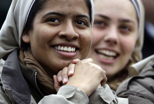 Two nuns smiled in St. Peter's Square at the Vatican last week after the election of Pope Francis.