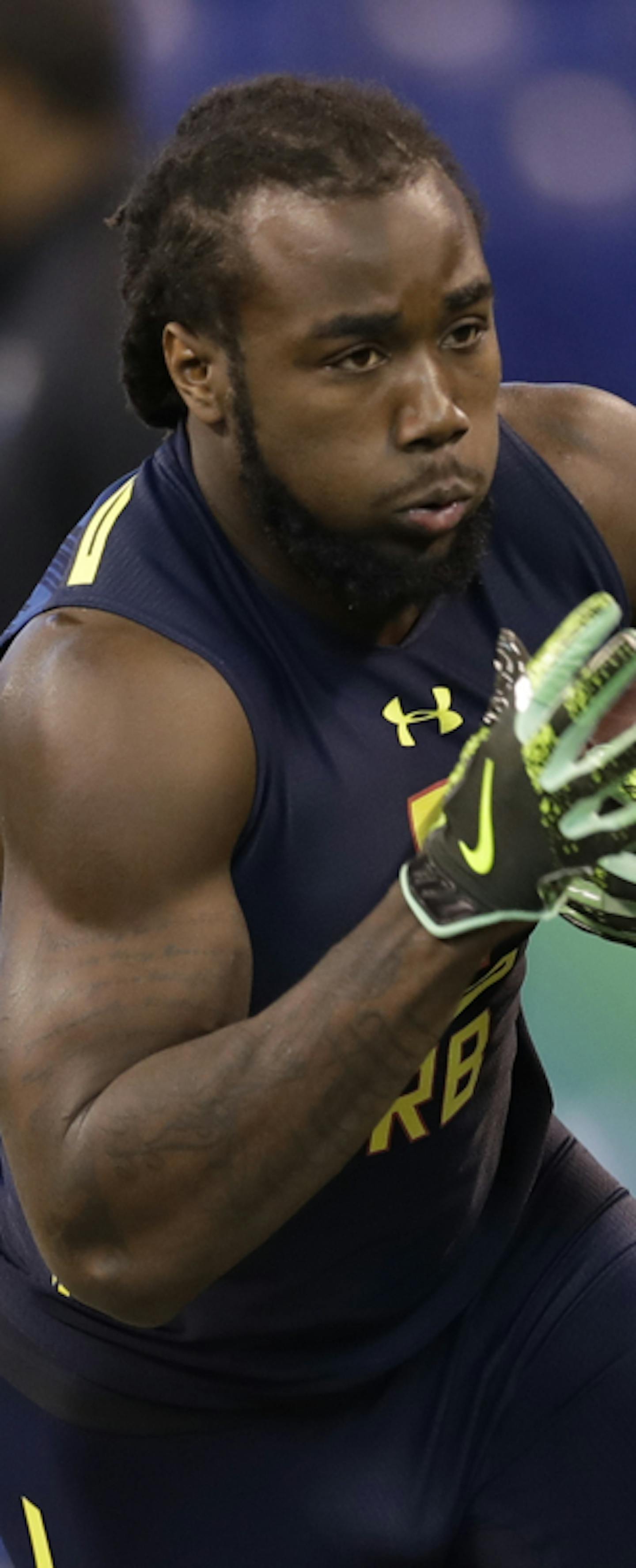 Florida State running back Dalvin Cook runs a drill at the NFL football scouting combine Friday, March 3, 2017, in Indianapolis. (AP Photo/David J. Phillip) ORG XMIT: INDP