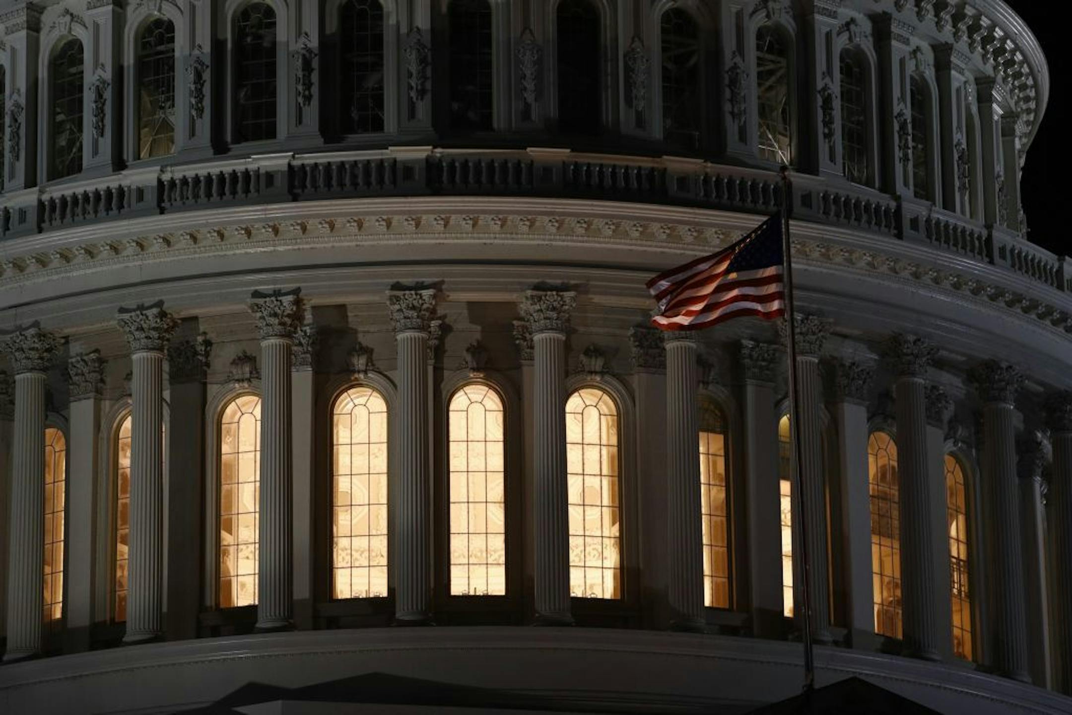 Light shines from inside the U.S. Capitol dome in Washington, late Tuesday, Nov. 12, 2019. The public impeachment inquiry hearings set to begin Wednesday will pit a Democratic attorney who built his reputation as a federal mob and securities fraud prosecutor against a GOP House Oversight investigator who helped steer some of the most notable probes of the Obama administration.