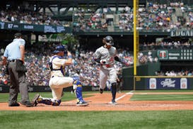 Austin Martin of the Twins scored a run during his team's 5-3 victory in Seattle on Sunday.