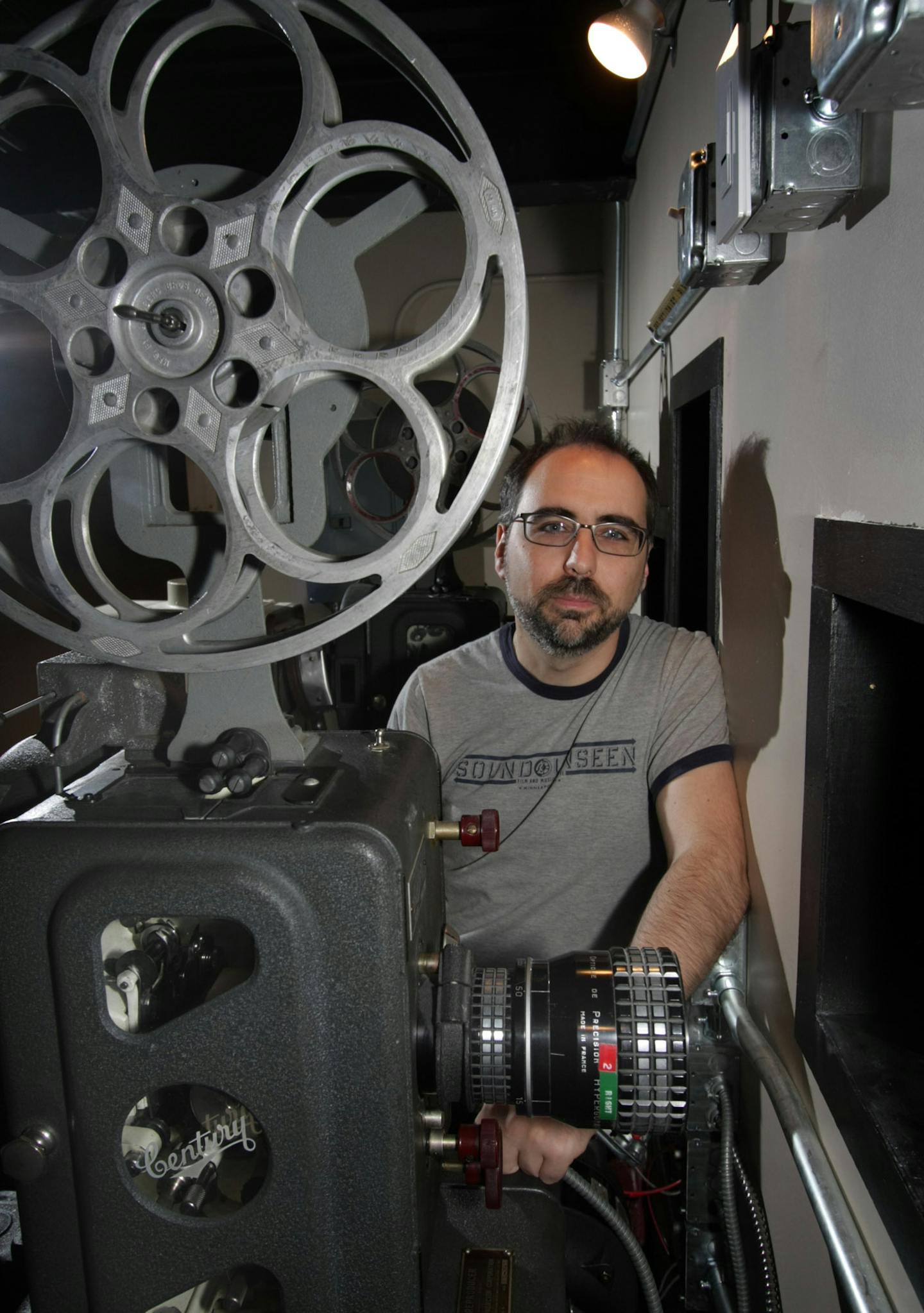 Tom sweeney &#xef; tsweeney@startribune.com Mpls, MN 6/25/2009 ] Barry Kryshka amidst the vintage film projectors he'll be using at Trylon microcinema, opening July 17 at 33rd and Minnehaha Avbestmn2012 bestmn2012