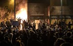 The Minneapolis Third Police Precinct is set on fire during a third night of protests following the death of George Floyd while in Minneapolis police 