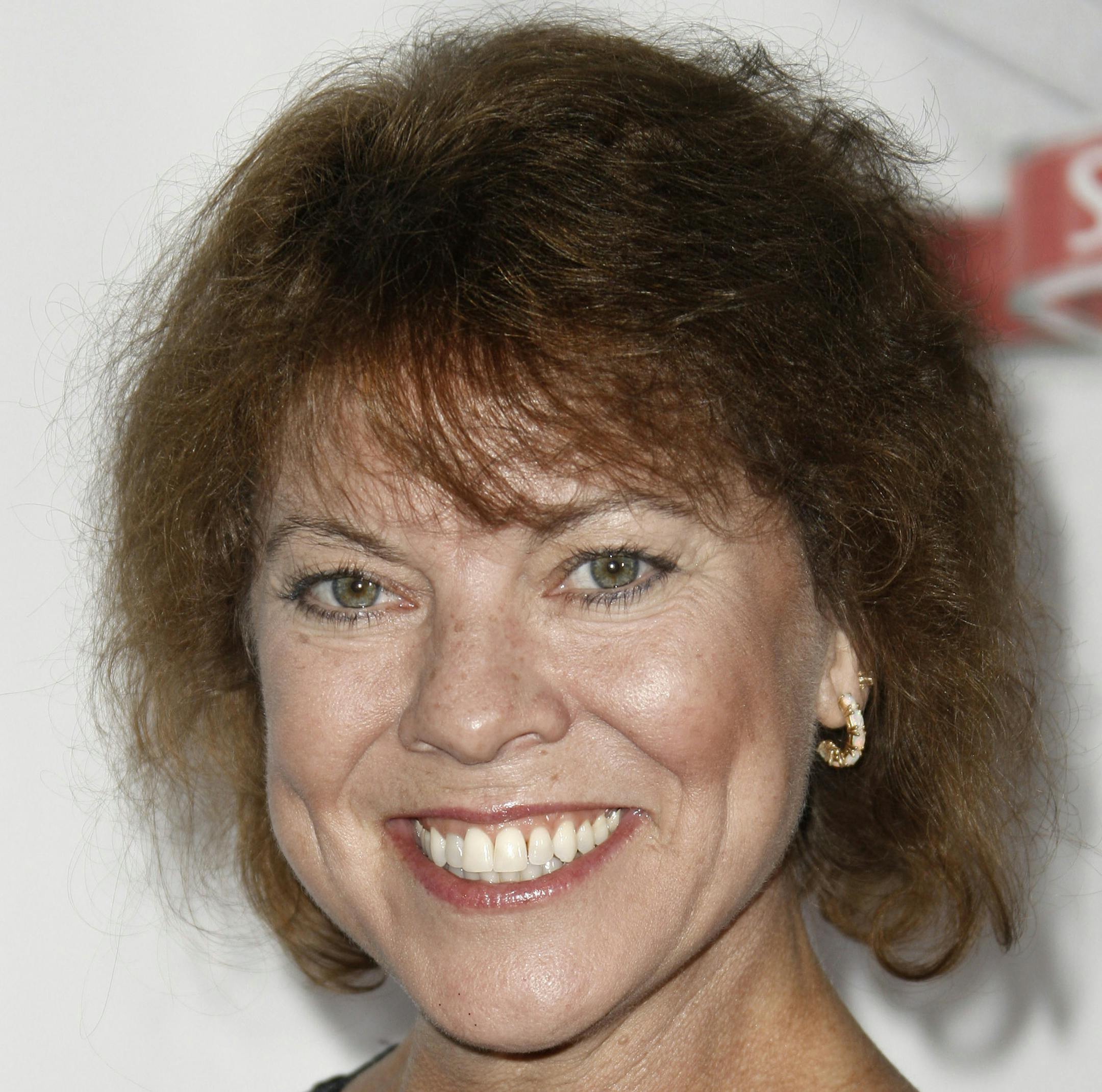 FILE - In this Sept. 24, 2008 file photo, Erin Moran arrives at the Fox Reality Channel Really Awards in Los Angeles. Moran, the former child star who played Joanie Cunningham in the sitcoms "Happy Days" and "Joanie Loves Chachi," has died at age 56. Police in Harrison County, Indiana said that she had been found unresponsive Saturday, April 22, 2017, after authorities received a 911 call. (AP Photo/Matt Sayles, File)