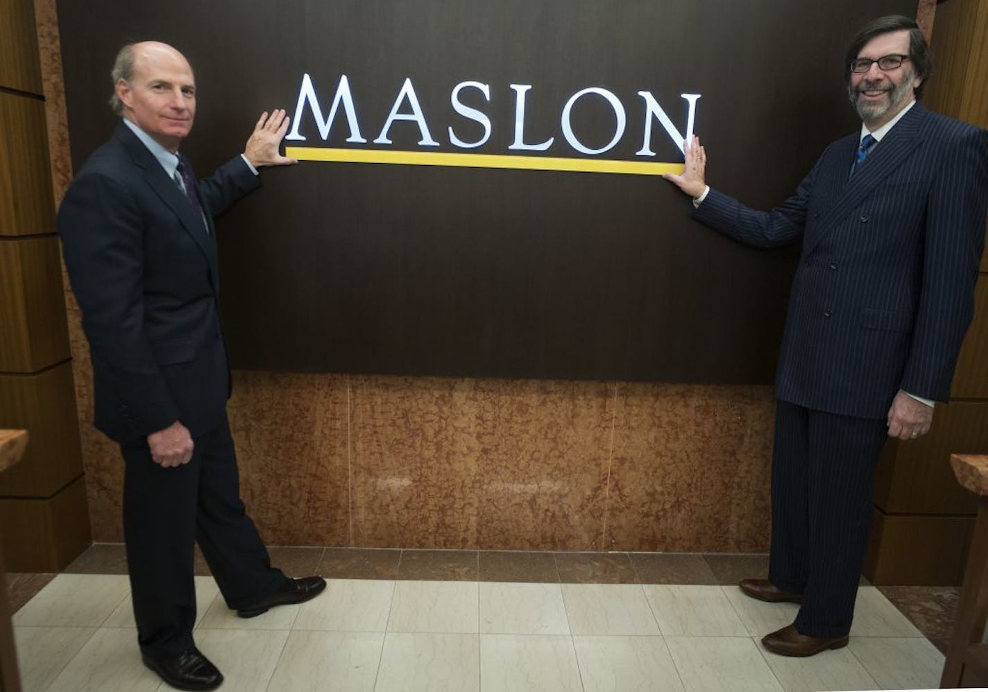 Cooper Ashley and Bill Pentelovitch, two of the firm's senior partners at Maslon, a historically significant player in the Minneapolis legal community founded by lawyer giants ranging from Supreme Court law clerks to judges.