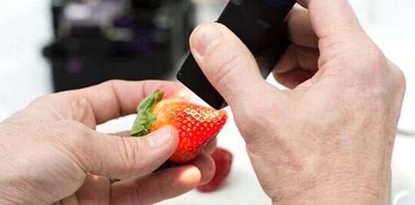One Target innovation involved scanning food items, such as strawberries, to gather data on freshness.