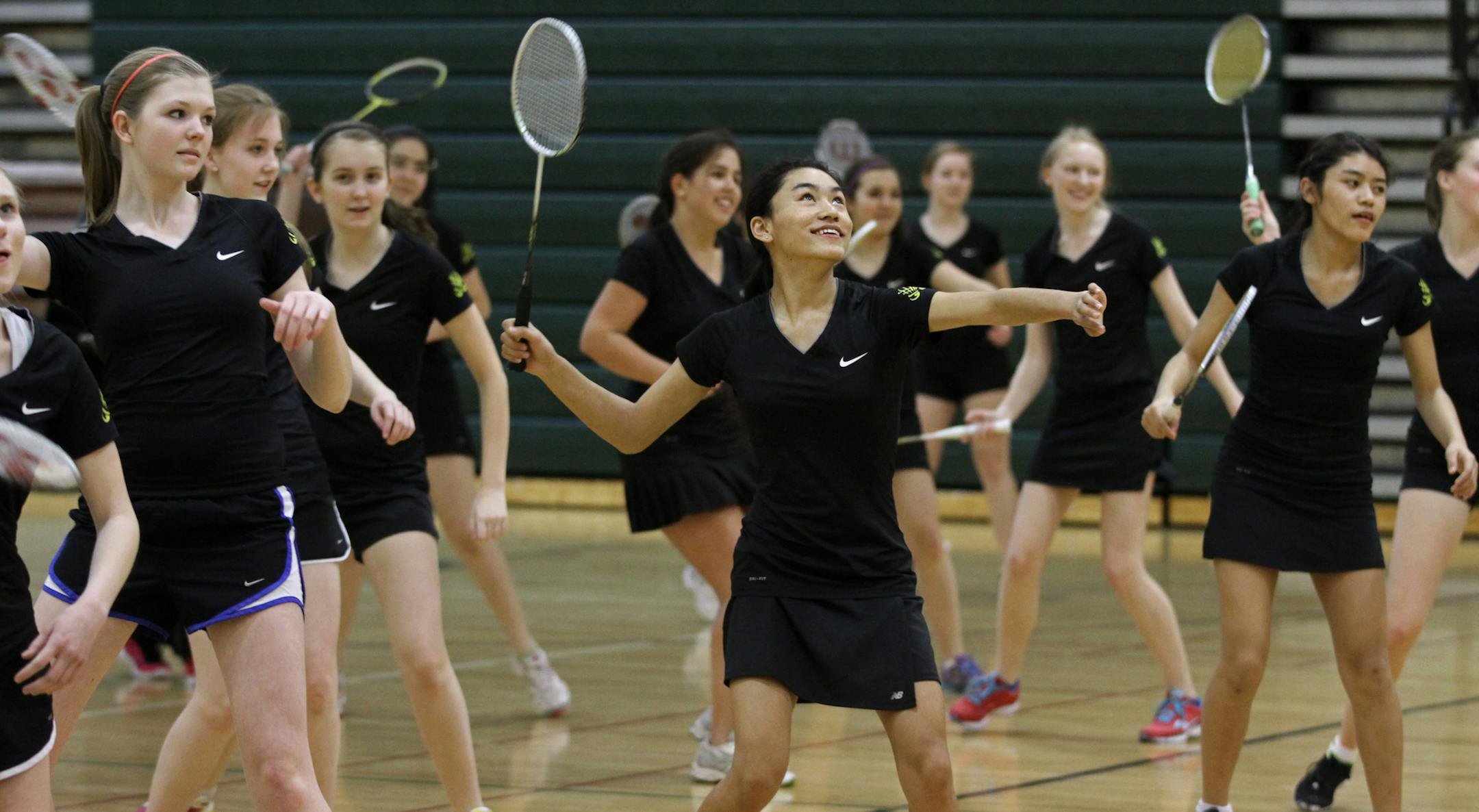 Some of the 70 girls on the Edina badminton team ran drills as they practiced in the South View Middle School gym on 3/28/13.] Bruce Bisping/Star Tribune bbisping@startribune.com