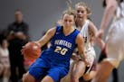 Eagles Taylie Schott dribbled pass Cougars Mariah McKeever during 1A quarterfinals Thursday at Maturi Pavilion March 14, 2019 in Minneapolis MN.] Ada-