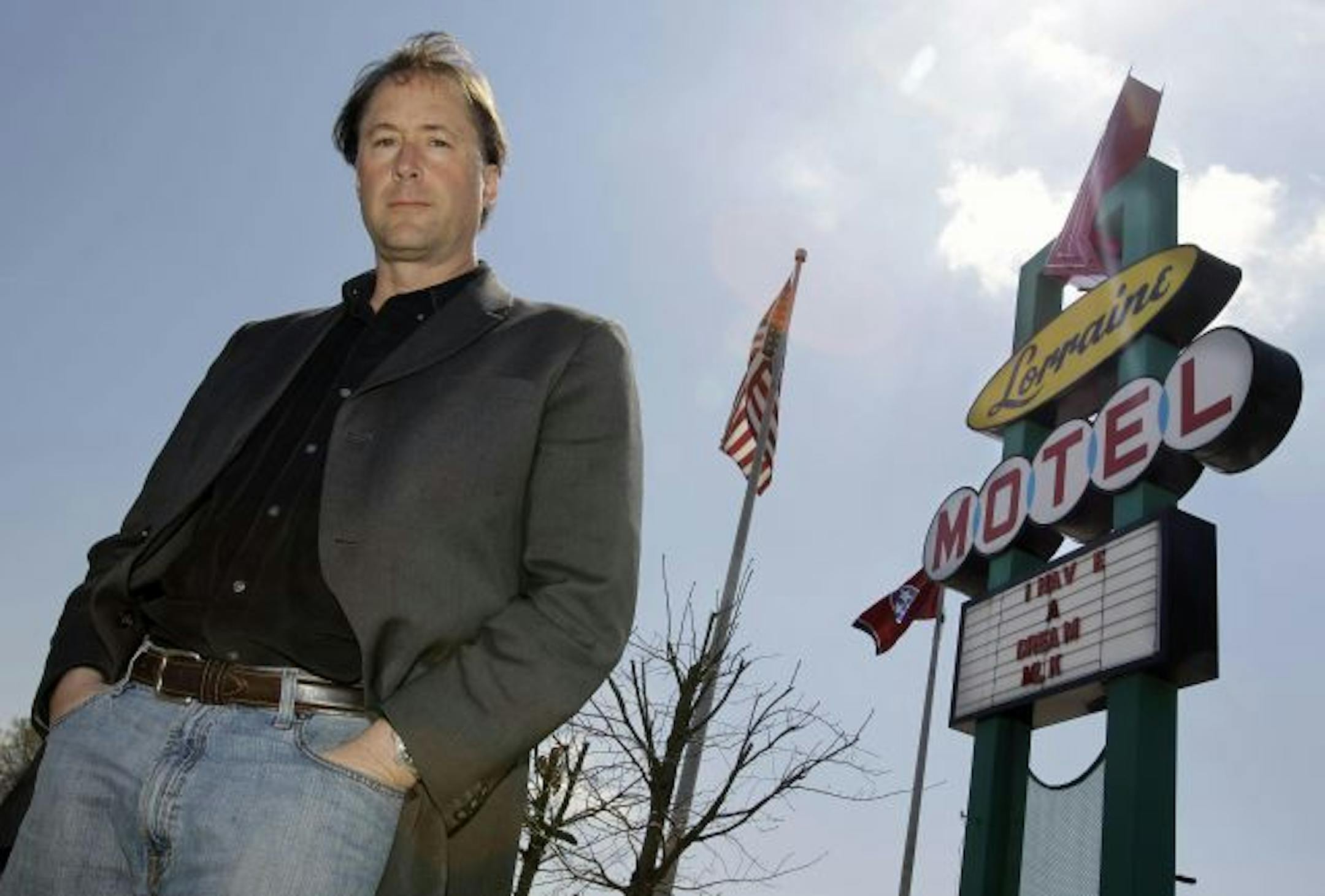 In this March 29, 2010 photo, author Hampton Sides is shown outside the Lorraine Motel in Memphis, Tenn. The Lorraine is the location Martin Luther King Jr. was killed in 1968. Sides' book, "Hellhound On His Trail," is a narrative history of the stalking of King by James Earl Ray and the search for Ray after King's murder.