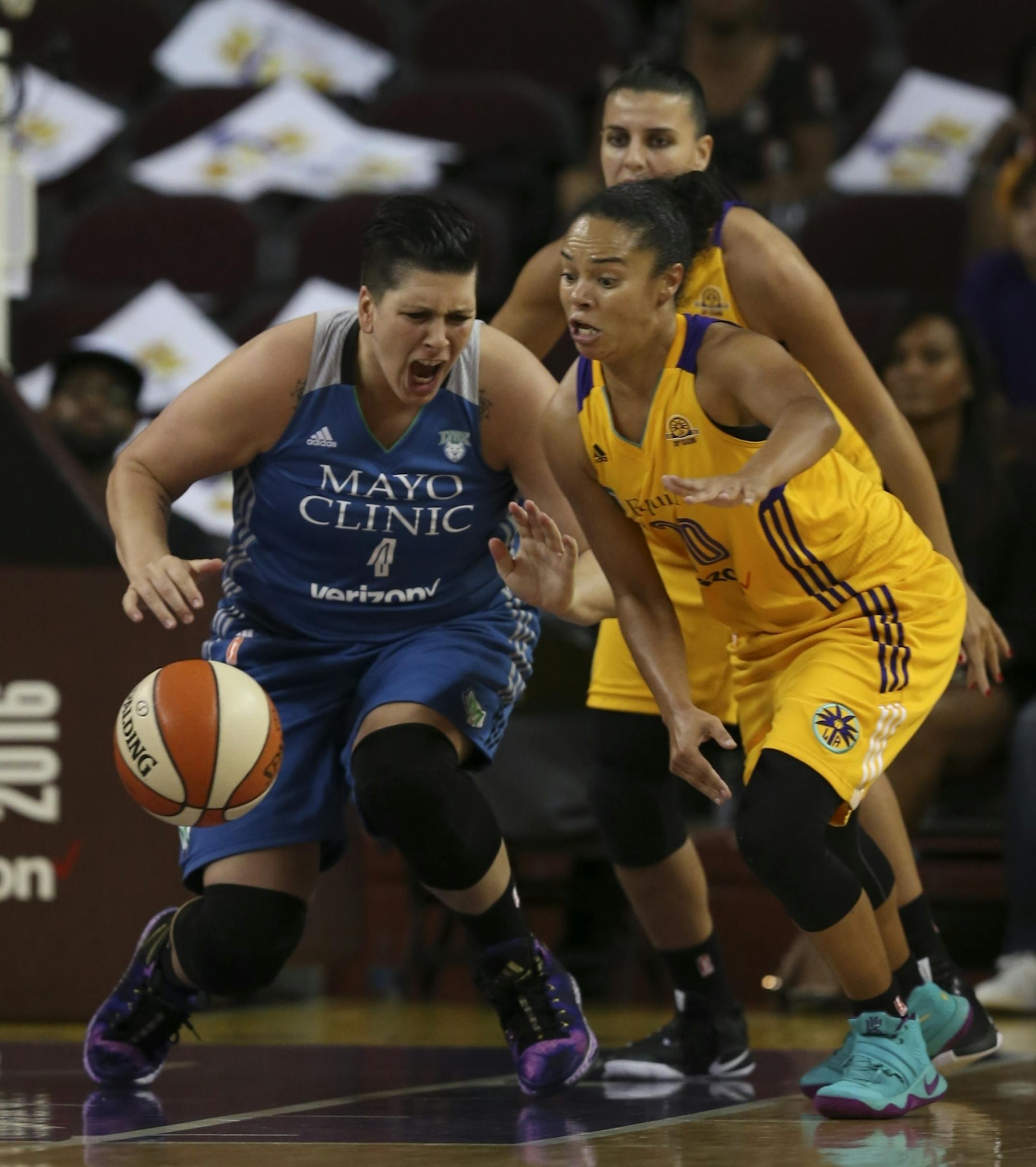 Minnesota Lynx center Janel McCarville (4) started heading to the floor after loosing control of the all near Los Angeles Sparks guard Kristi Toliver (20) in the third quarter.