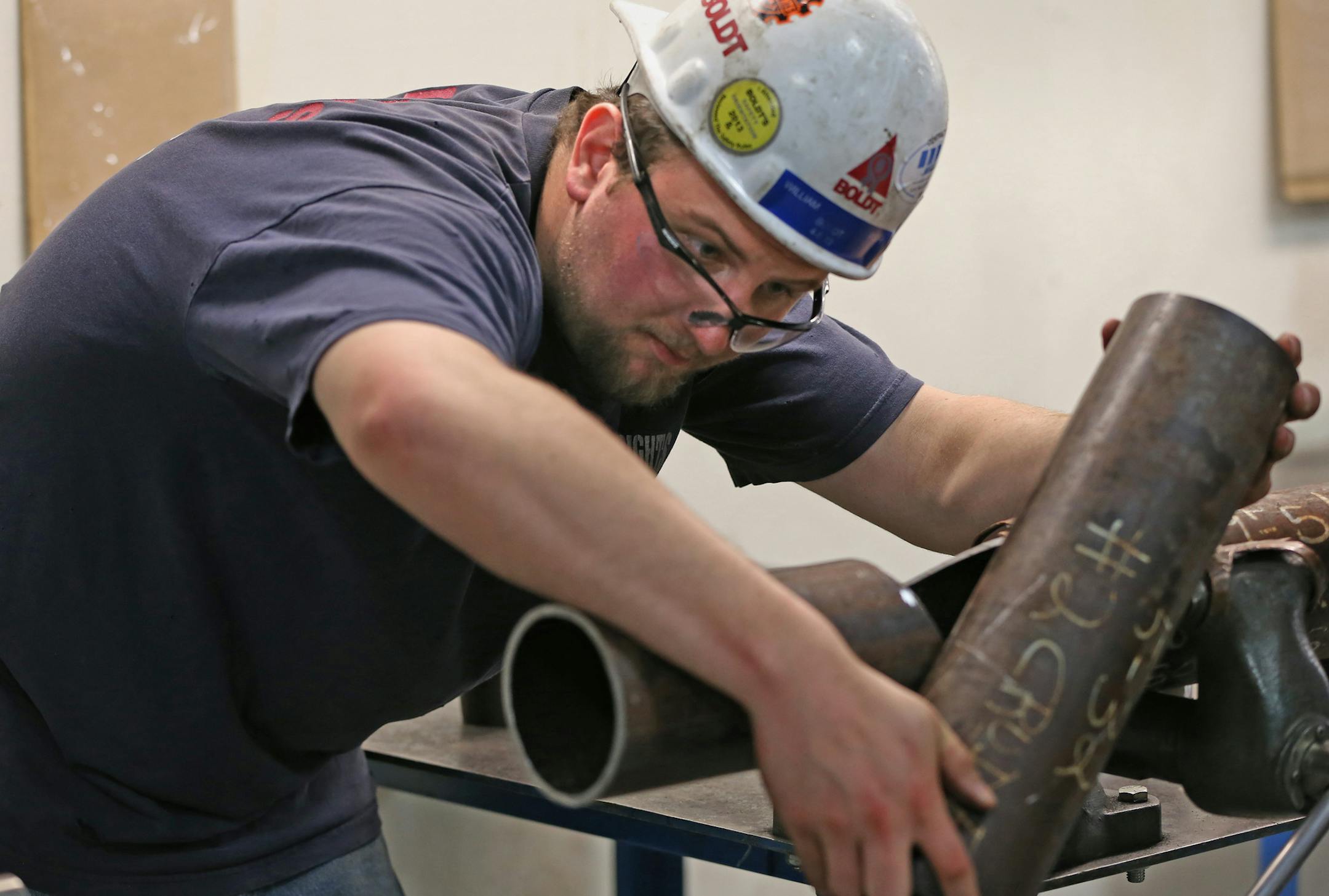 William Fish of Webster WI., worked on a pipe exercise during training at the L.J. Shosten Union Traing Center in St. Paul. Training for industrial jobs has picked up around the state as factories rush to erase job skills gap and prep for baby boomer departures. Industrial mill wright and pile driver apprentices were in training at the L.J. Shosten Union Traing Center doing welding, optics training and possibly helping to install robotics donated by Ford Motor Co.] Bruce Bisping/Star Tribune bbi