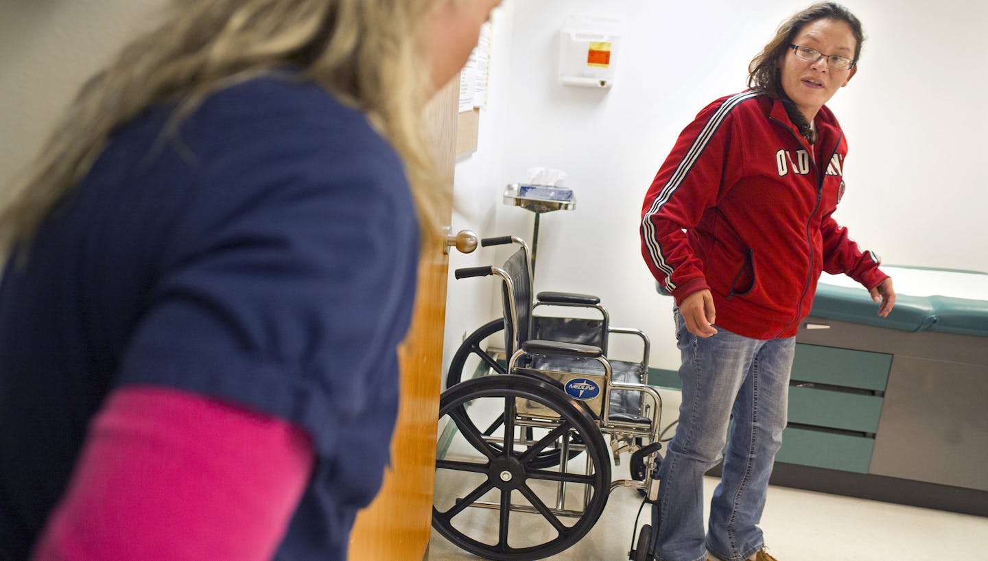 A IHS in Wagner, South Dakota on September 23, 2014, Jessica Sanchez had her foot looked at by a nurse. Sanchez got a high deductible policy through the Affordable Care Act because she can then see private sector providers after she fulfills her deductible through Indian Health Services .]Richard Tsong-Taatarii/rtsong- taatarii@startribune.com