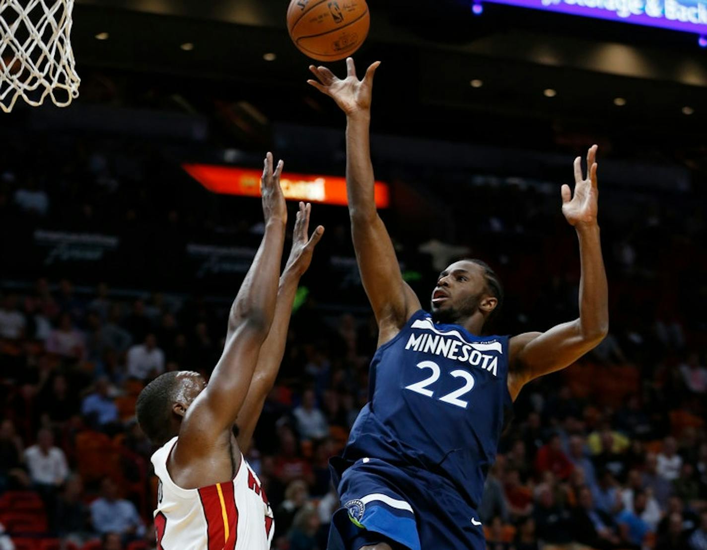 Minnesota Timberwolves guard Andrew Wiggins (22) takes a shot against Miami Heat forward Bam Adebayo during the first half of an NBA basketball game, Monday, Oct. 30, 2017, in Miami.