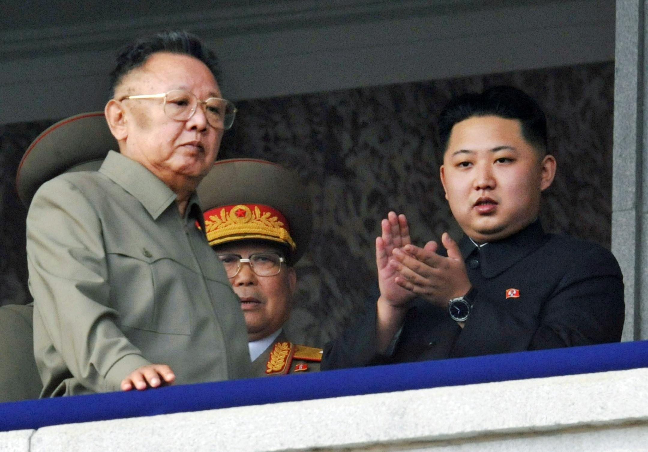 In this Oct. 10, 2010 file photo Kim Jong Un, right, along with his father and North Korea leader Kim Jong Il, left, attends during a massive military parade marking the 65th anniversary of the ruling Workers' Party in Pyongyang, North Korea.