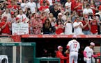 Fans clap as Los Angeles Angels starting pitcher Shohei Ohtani, of Japan, leaves the field during the seventh inning of a baseball game against the Mi