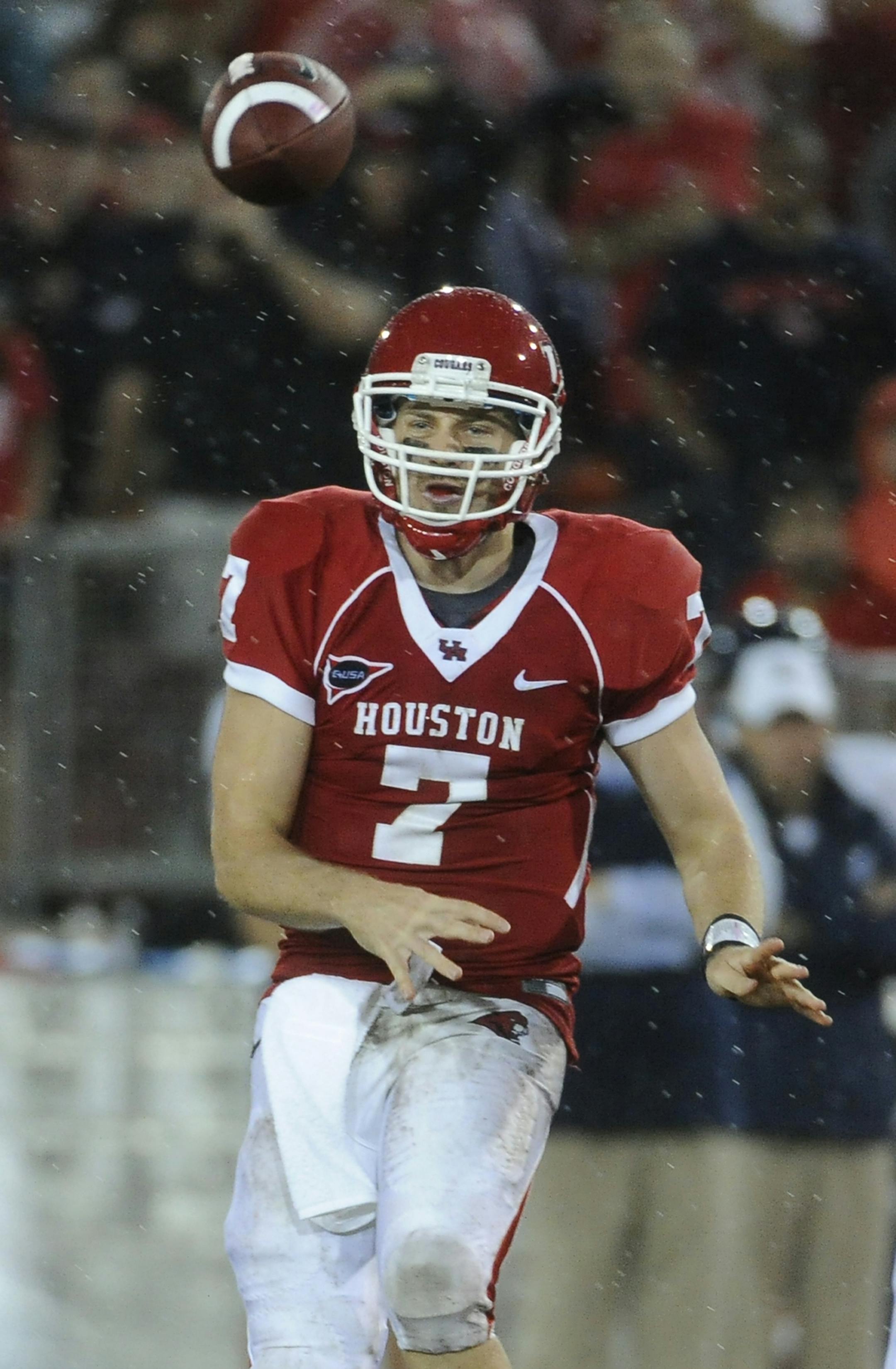 Houston quarterback Case Keenum throws a pass during the second half of an NCAA college football game against Rice on Thursday, Oct. 27, 2011, in Houston. Houston won 73-34. (AP Photo/Pat Sullivan) ORG XMIT: MIN2013080819234833