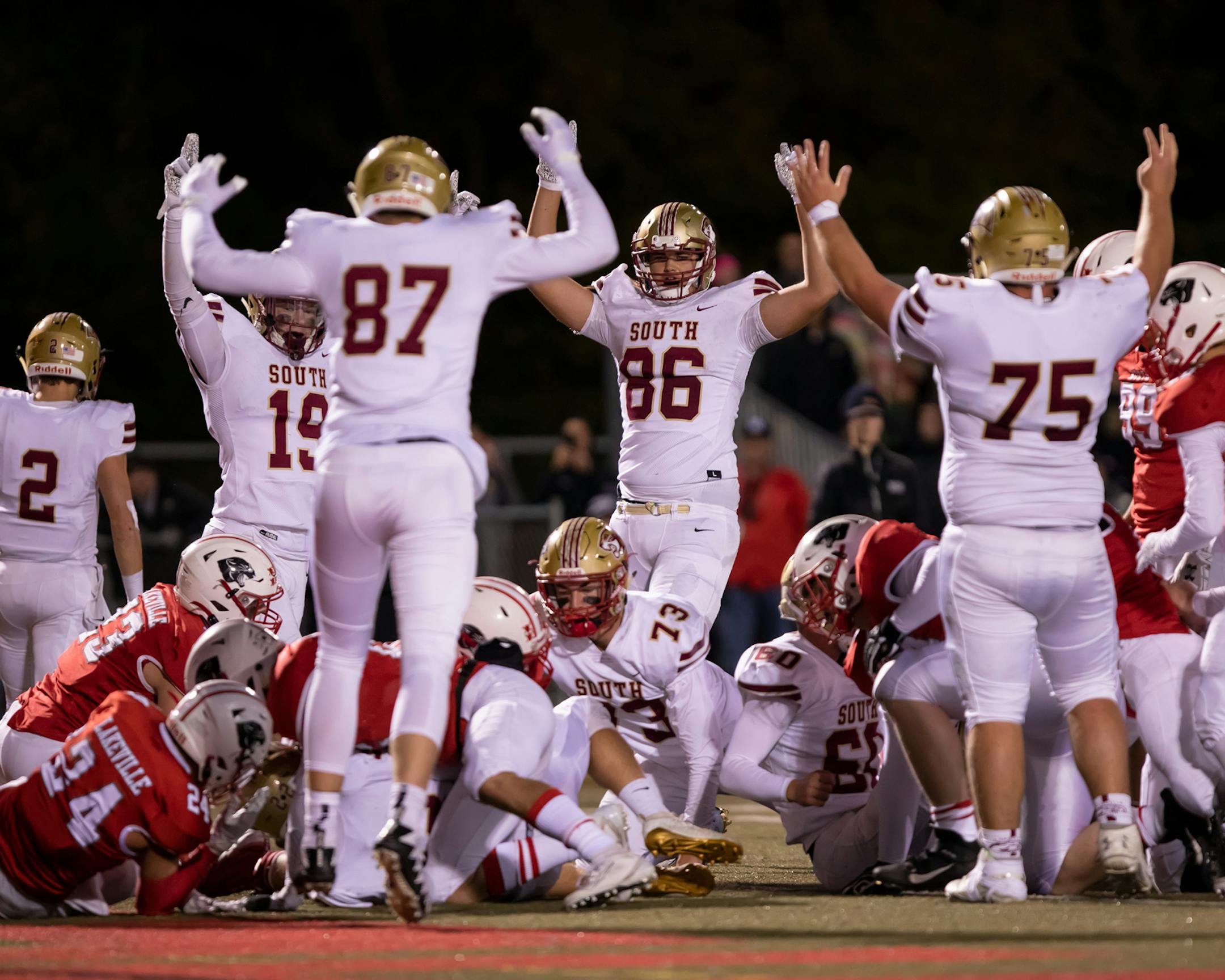 Players celebrated a Lakeville South touchdown. [Special to Star Tribune, photo by Matt Blewett, Matte B Photography].