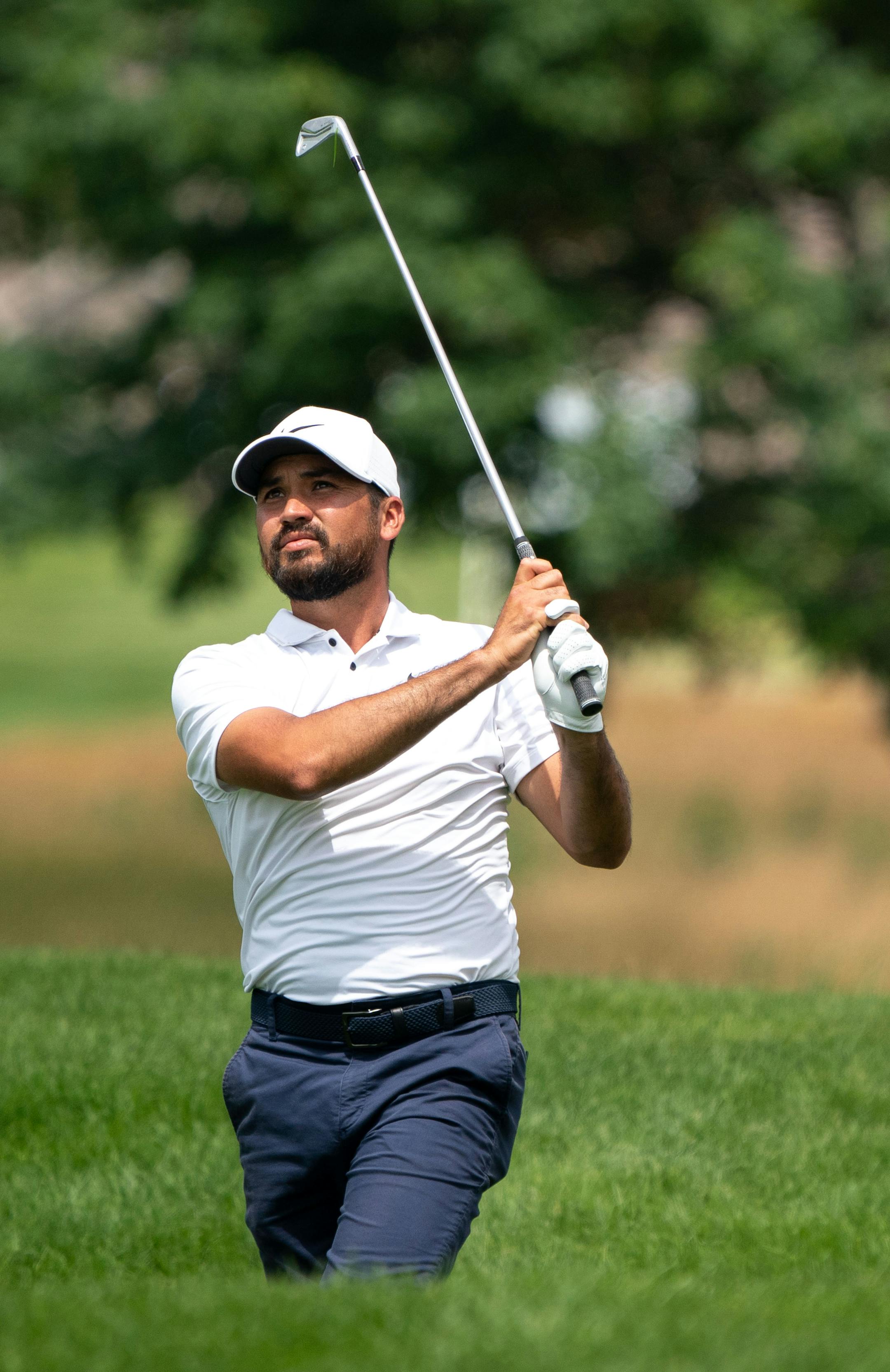 Jason Day watches his shot on the ninth hole during the 3M Open.