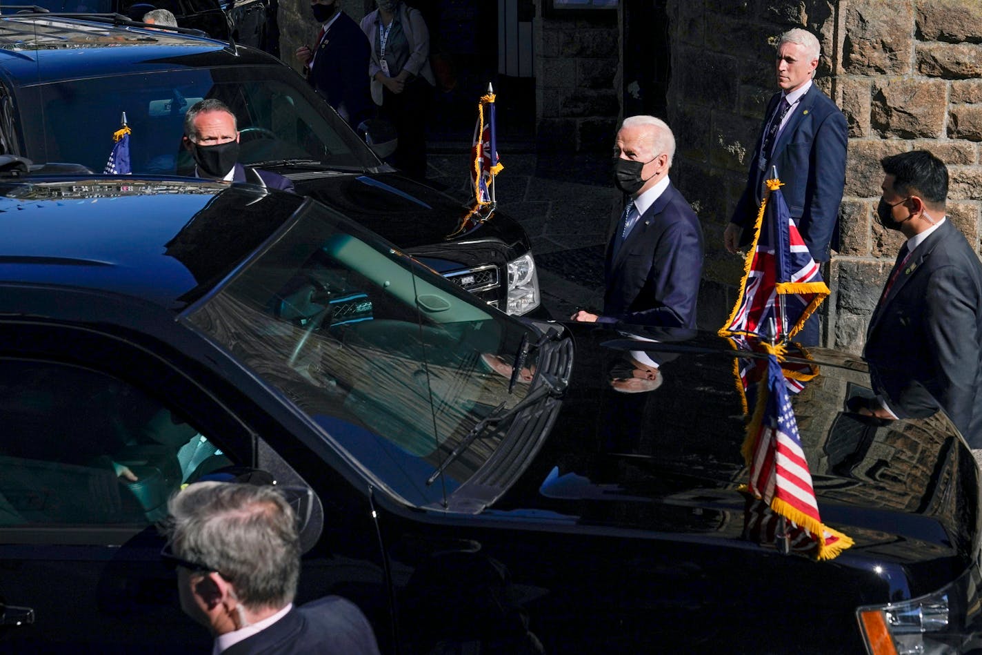 U.S. President Joe Biden, center, left after attending Mass at Sacred Heart and St. Ia Catholic Church, in St. Ives, southern England, Sunday, June 13, 2021.