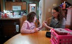 Linsey Rippy tested Madi's blood with a small stick and a blood test. She then called the results into her doctor at the Mayo Clinic. The INR test mea