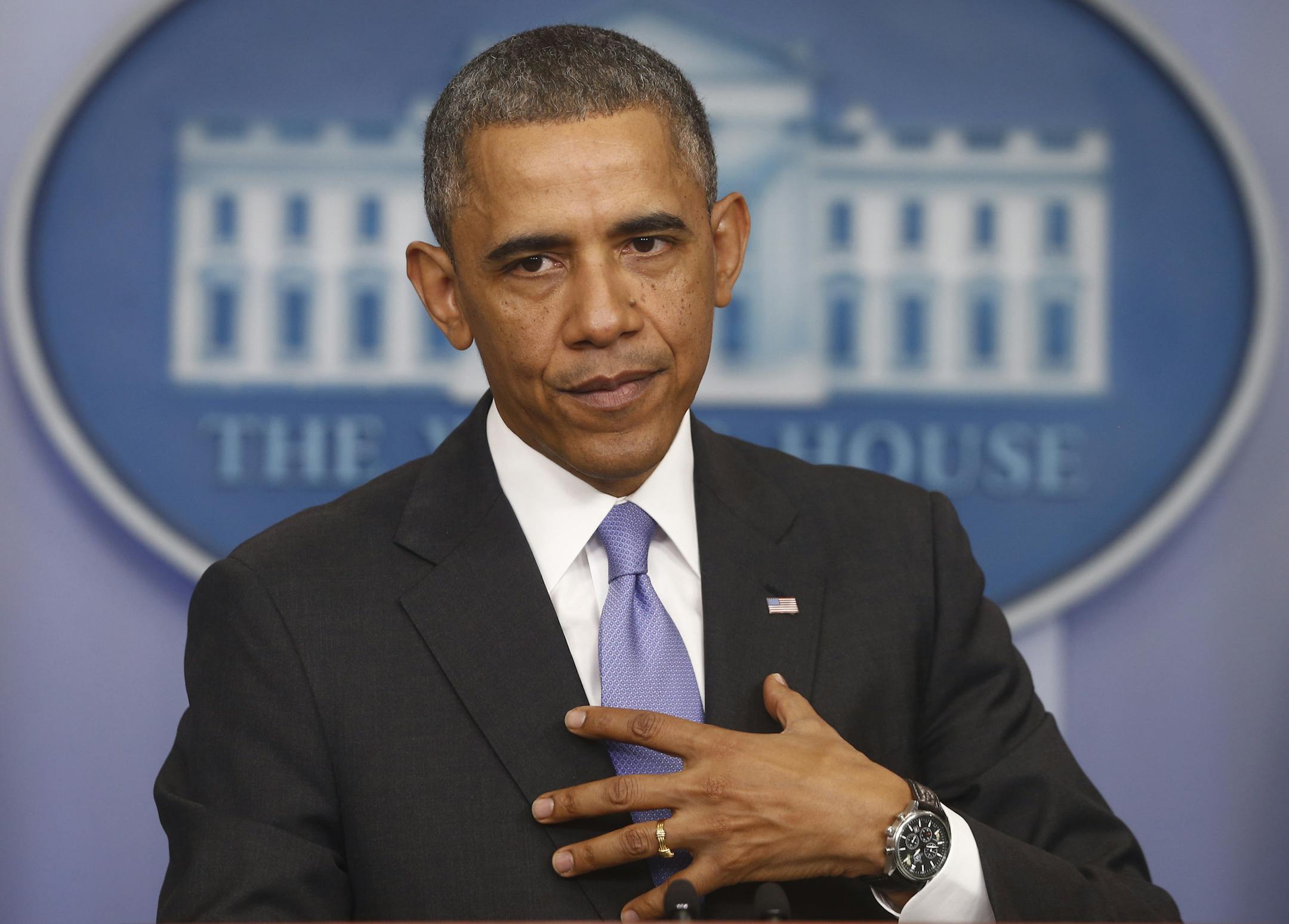 President Barack Obama speaks about his signature health care law, Thursday, Nov. 14, 2013, in the Brady Press Briefing Room of the White House in Washington. Bowing to pressure, President Barack Obama intends to permit continued sale of individual insurance plans that have been canceled because they failed to meet coverage standards under the health care law, officials said Thursday. (AP Photo/Charles Dharapak)
