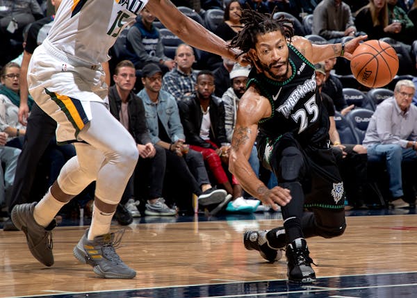 Wolves guard Derrick Rose drove the lane in the third quarter against the Utah Jazz at Target Center on Wednesday. The Timberwolves won 128-125 behind