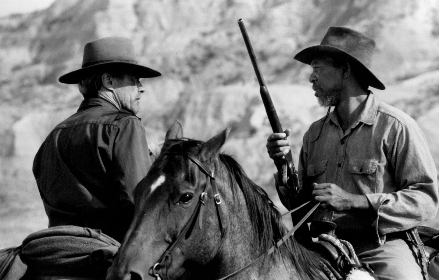 August 13, 1992 Clint Eastwood and Morgan freeman star as bounty-hunting partners in "Unforgiven," a Warner Bros. release. Clint Eastwood and Morgan Freeman portray bounty-hunting partners in "Unforgiven."