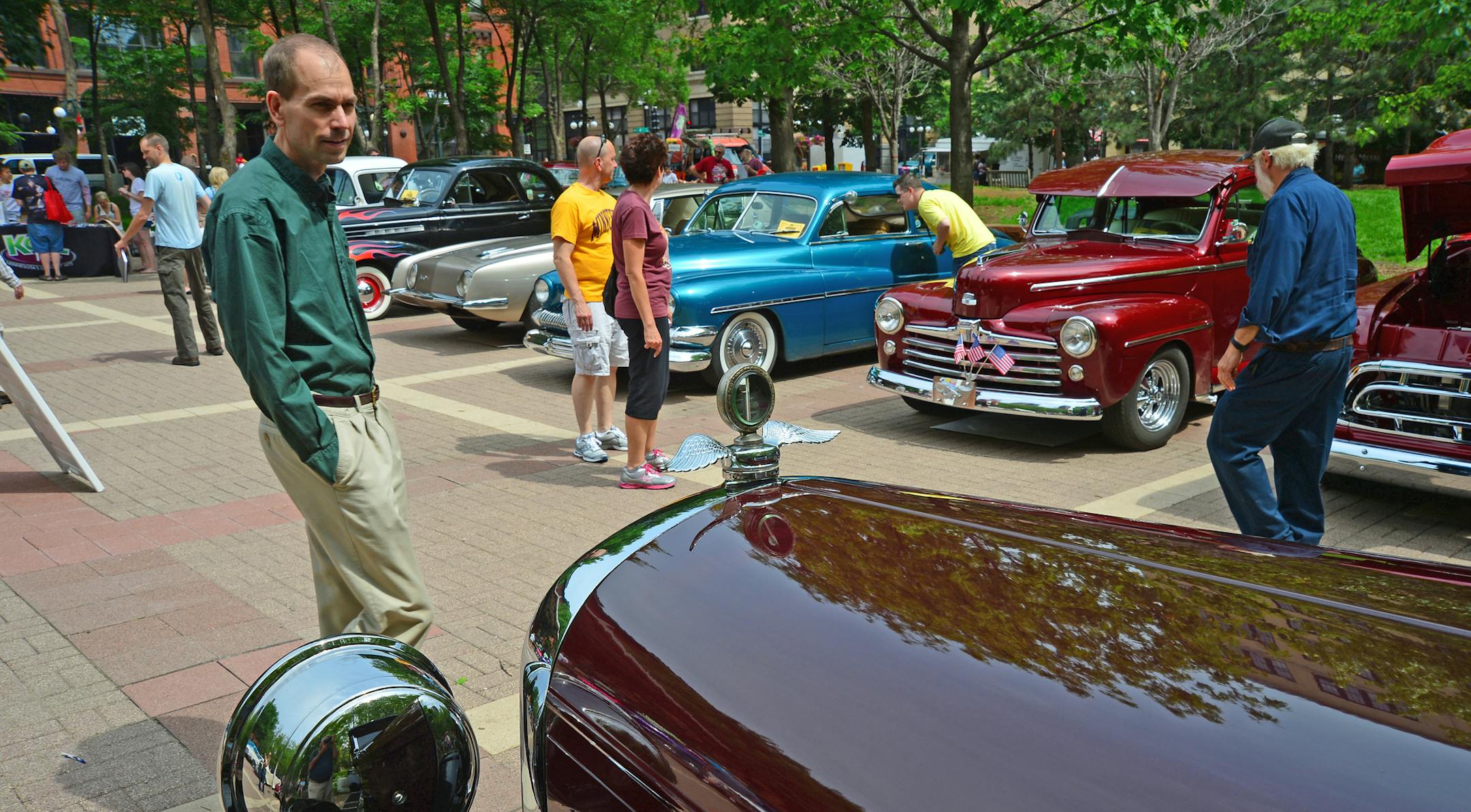More than a dozen street rods cruised into downtown St. Paul to help kick off the MSRA Back to the Fifties Weekend. The cars were parked in Mears Park and featured some classic vintage cars along with 1950's music by the Accents and Hula Hoop to go with the music. .] Richard.Sennott@startribune.com Richard Sennott/Star Tribune. St Paul, Minnesota Thursday 6/20/13) ** (cq)
