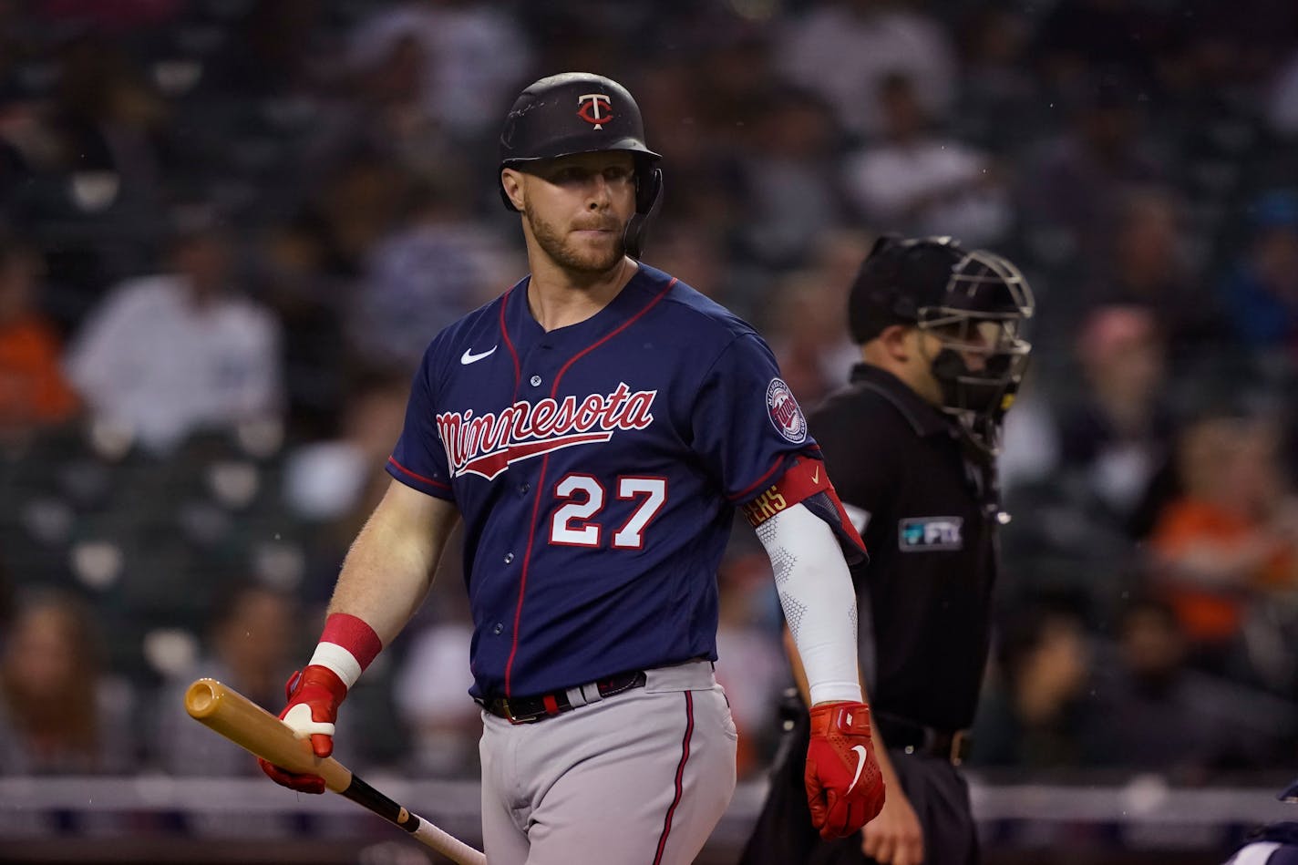 Minnesota Twins' Ryan Jeffers walks back to the dugout after striking out during the eighth inning of a baseball game against the Detroit Tigers, Wednesday, June 1, 2022, in Detroit. (AP Photo/Carlos Osorio)