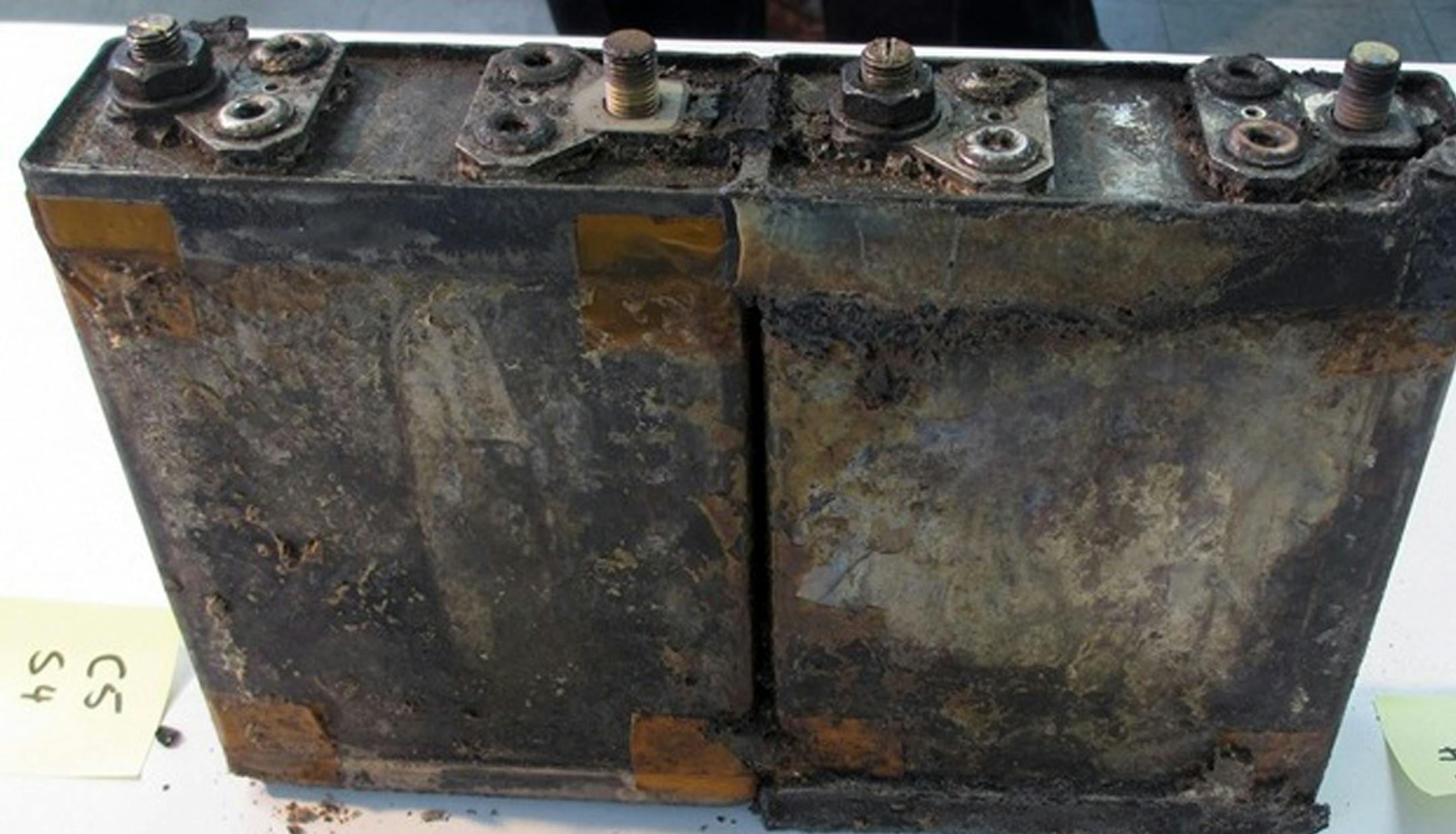 This Jan. 31, 2013 photo provided by the Japan Transport Safety Board shows two of eight damaged cells in the battery, that overheated on the All Nippon Airways Boeing 787 on Jan. 16 and prompted an emergency landing, during an investigation by U.S. and Japanese aviation safety regulators at its manufacturer GS Yuasa's headquarters in Kyoto, Japan. An investigation into the battery found evidence of the same type of "thermal runaway" seen in a similar incident in Boston, officials said Tuesday,