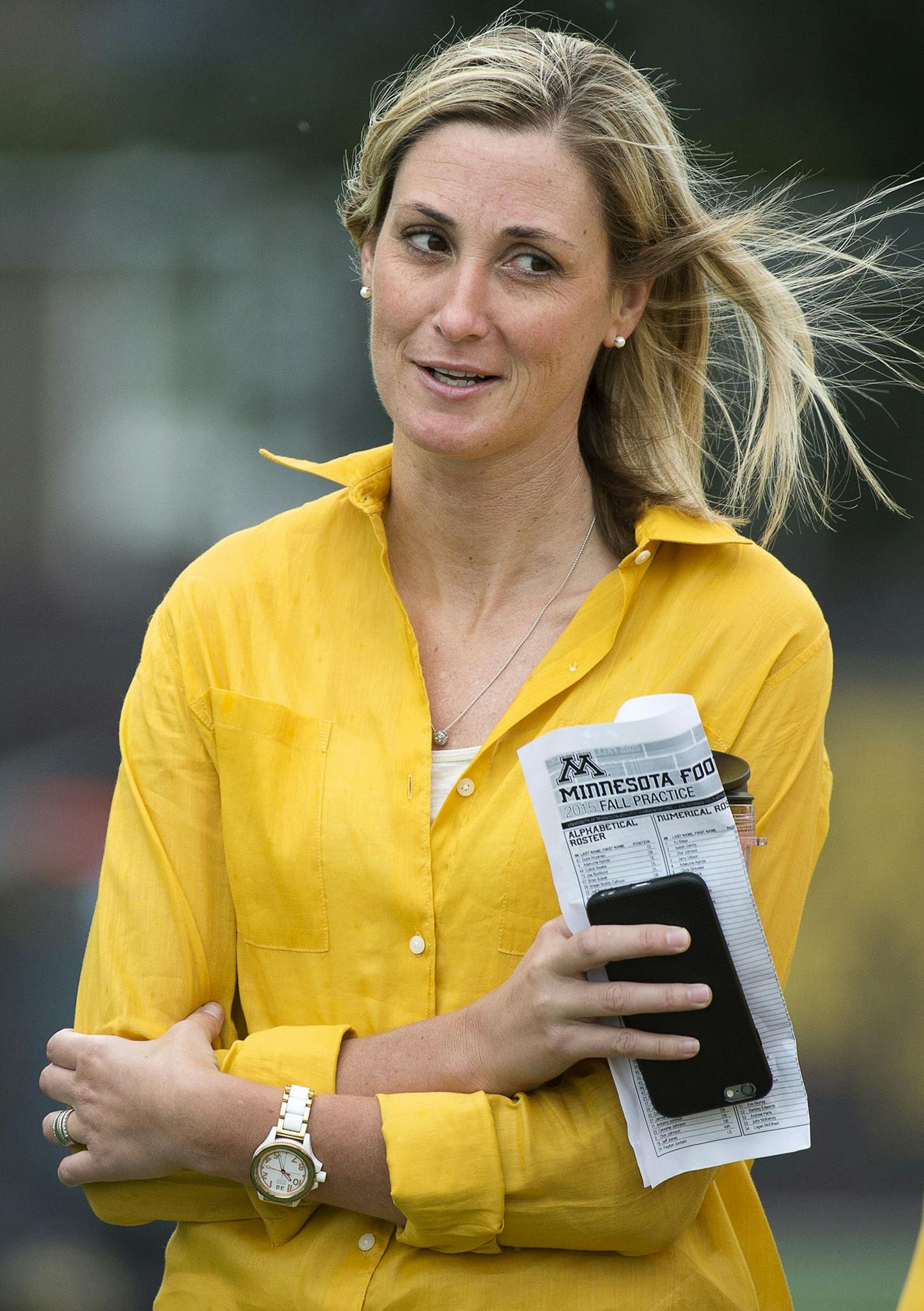 Interim Athletic Director Beth Goetz talked with people during the second practice of the season for Gophers football at Gibson-Nagurski field, in Minneapolis, Minn. on Saturday August 8, 2015. ] RACHEL WOOLF &#xb7; rachel.woolf@startribune.com