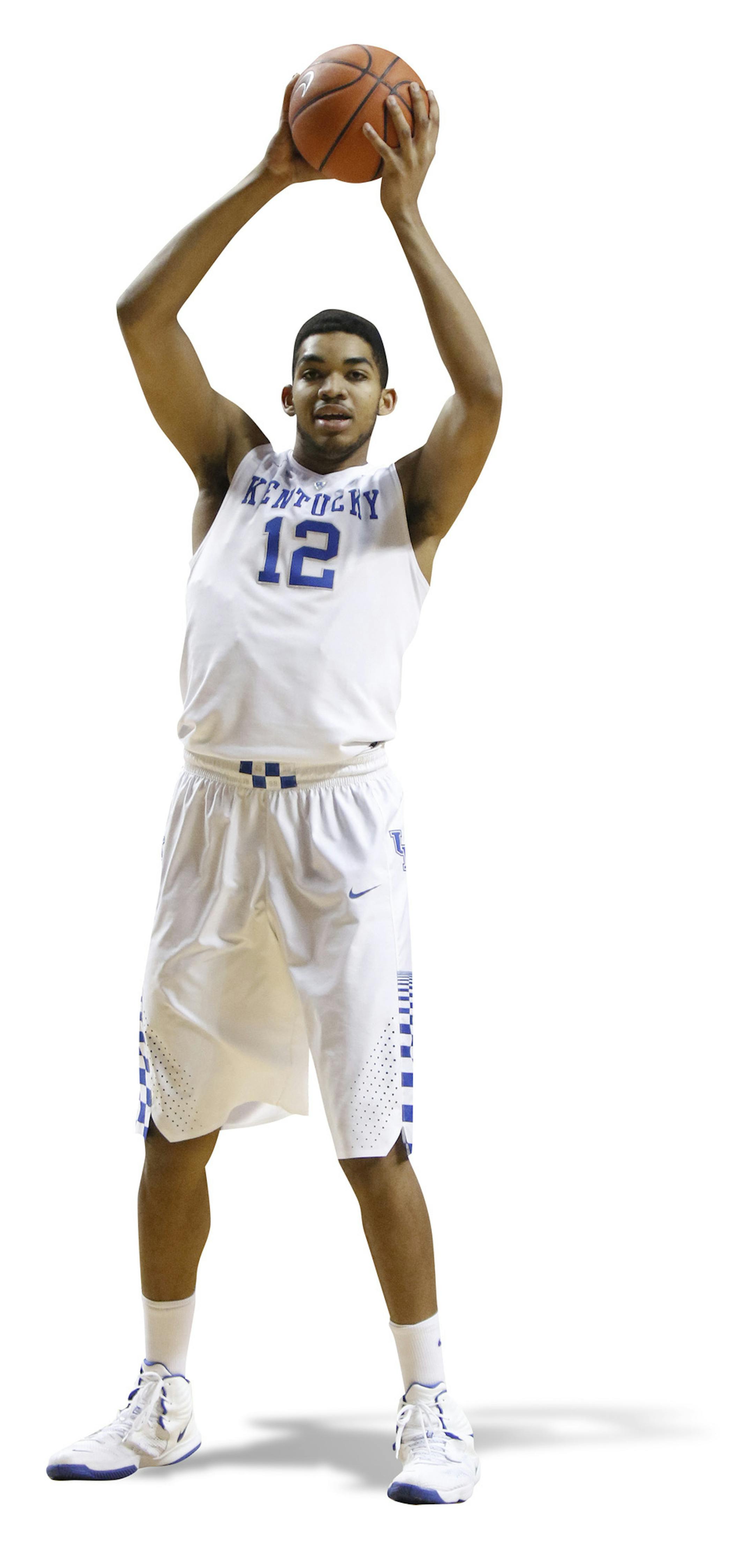 Kentucky's Karl-Anthony Towns plays during the second half of an NCAA college basketball game against Texas, Friday, Dec. 5, 2014, in Lexington, Ky. Kentucky won 63-51. (AP Photo/James Crisp) ORG XMIT: OTKJC105 ORG XMIT: MIN1504032109011881